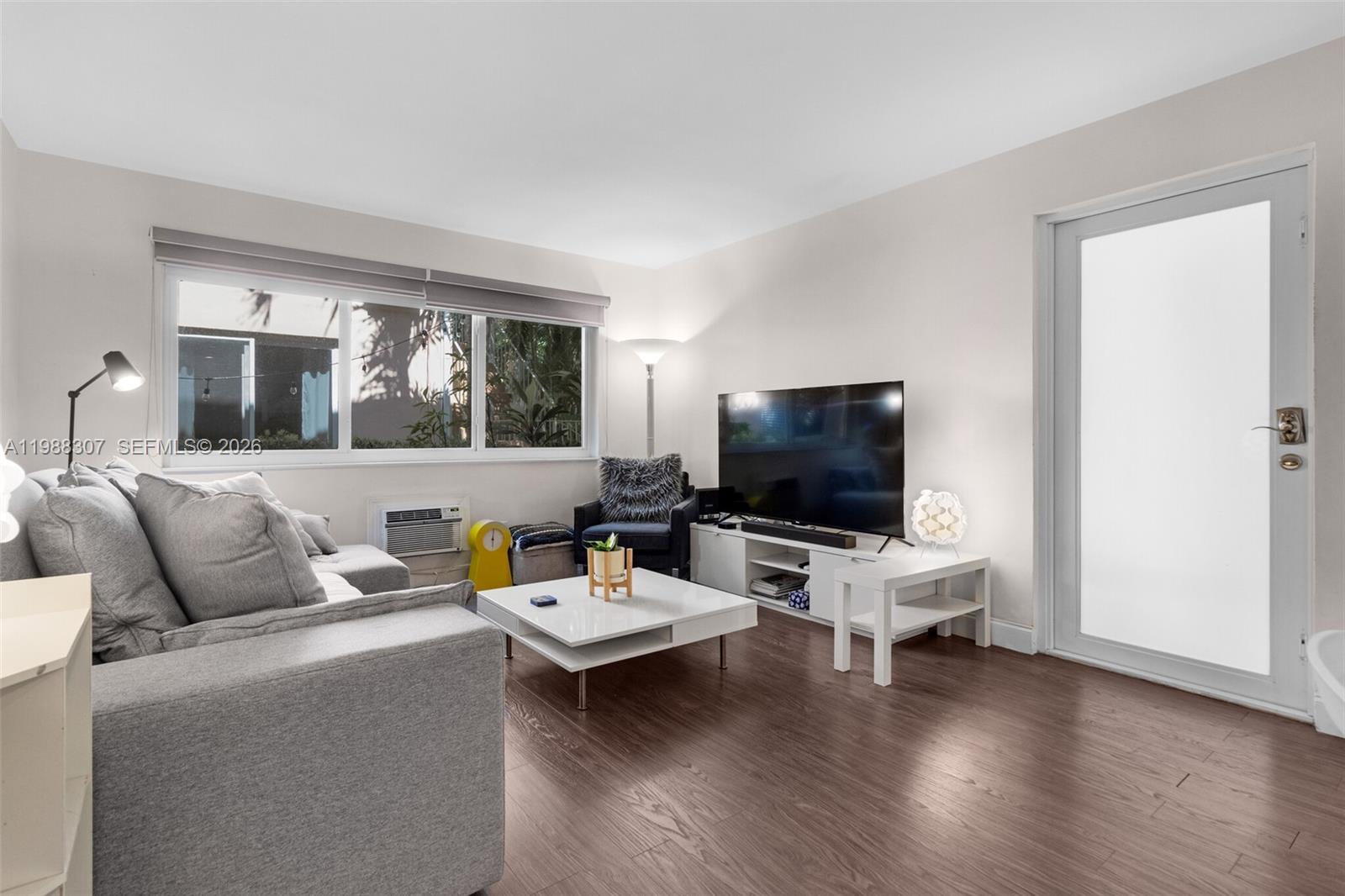 600 sqft 1 bedroom 1 bathroom ground-floor oasis located in a gated community on beautifully tree-lined Meridian Avenue, directly across from Flamingo Park. Perfectly positioned in the heart of South Beach, just minutes from the Ocean, top-rated restaurants, coffee shops, grocery stores, and all the best local hotspots.  This updated unit offers a comfortable and functional layout featuring tile floors throughout, an open kitchen with island, and a spacious walk-in closet. Enjoy the convenience of two A/C units and a versatile space ideal for a home office.  Offered turnkey or partially furnished, with select furniture pieces available for sale — making it an excellent option for both end-users and investors.  A rare opportunity to enjoy Miami Beach living in a serene, park-side setting!  No Special Assessments planned for 2026.