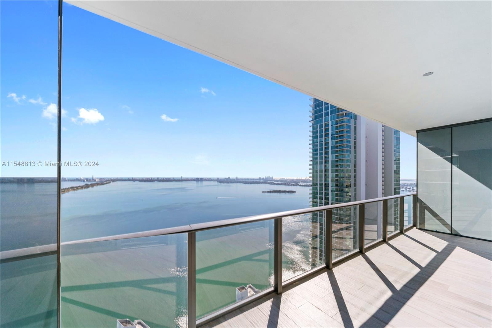 Experience endless panoramic bay and ocean views from the oversized balcony  of this 1 bedroom, 2.5 bathrooms unit designed by Piero Lissoni. Step in through the private foyer to discover floor to ceiling windows, 10 Foot high ceilings, open concept floor plan, high-end kitchen appliances and beautiful Italian kitchen design. Gran Paraiso Condo features high end amenities such as 24h security, covered parking, valet parking, concierge, pool, spa, gym, social room, BBQ grills, tennis courts, private elevator access with private foyers, lush landscape gardens, children playroom and much more. Unit rented until August 29th 2025 at $4,200 per month. 24 hrs notice for showings