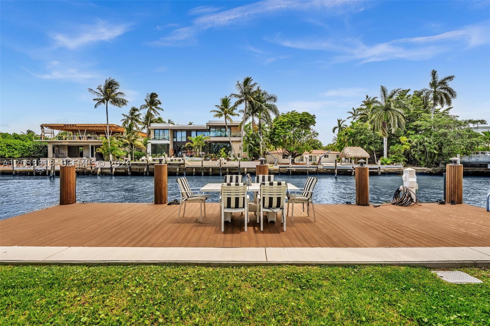 Tucked away on the exclusive, double-gated Belle Meade Island, this waterfront home offers a laid-back Miami lifestyle with direct access to Biscayne Bay and the open ocean. Set on a 12,375 SF lot with 75 feet of waterfront and no fixed bridges, the property is ideal for boating enthusiasts and those who appreciate privacy, space, and serene water views. Inside the home features 4 bedrooms, 3 bathrooms, generous living spaces, and an abundance of natural light throughout. Enjoy a private, heated pool, expansive backyard, and waterfront dock—the perfect backdrop for morning coffee, weekend gatherings, or sunset evenings by the water.
Additional highlights include an EV charger,2 refrigerators,  ample parking, mature tropical landscaping, and 24-hour security within one of Miami's most sought-after gated neighborhoods. Conveniently located just minutes from the Design District, Wynwood, Miami Beach, and Downtown Miami, this home places the best of the city within easy reach while offering a peaceful retreat from it all. Available June 19th.