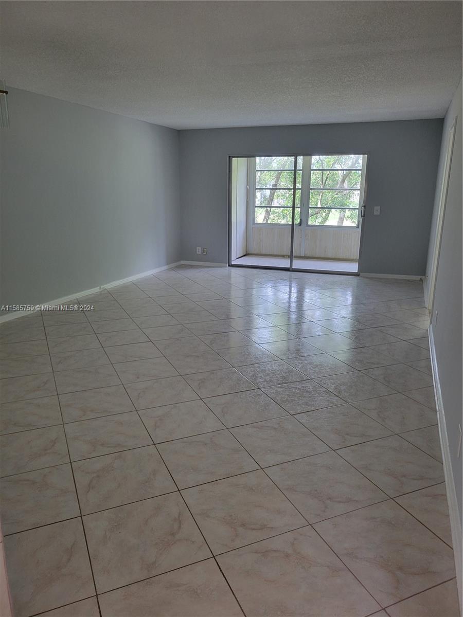 Resort style living in most desirable Pembroke Pine Community. This 2/2 bathroom has been updated beautifully, brand new kitchen with gorgeous granite countertop, bathroom have been updated and modernized, wooden floors in bedrooms and ceramic tile throughout living areas. Washer and dryer in unit. Balcony with view to the wonderful gulf course also available for you entertainment. Spectacular clubhouse with great amenities. This property is a 55+ community per association.