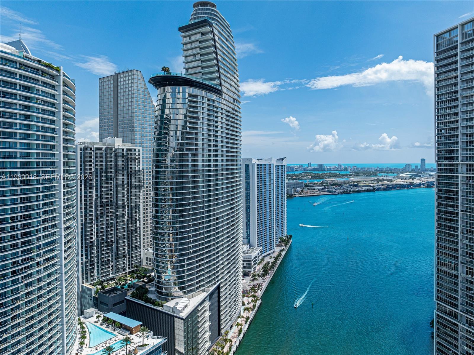 Experience refined waterfront living in the iconic Aston Martin Residences. This 20th-floor, 2BR/2.5BA luxury residence spans 1,578 SF of light-filled interior space with floor-to-ceiling glass showcasing Biscayne Bay and city skyline views. Features include elegant marble flooring, custom finishes, and a private balcony for breathtaking sunrises.

Enjoy world-class amenities across multiple sky levels: a resort-style infinity pool, elite spa/wellness center, fitness center, cinema, virtual golf, and 24-hour concierge. Includes valet and exclusive marina access. Ideally located in downtown’s DuPont Plaza, minutes from Brickell and fine dining. Own a piece of an architectural landmark in Miami’s most prestigious new tower