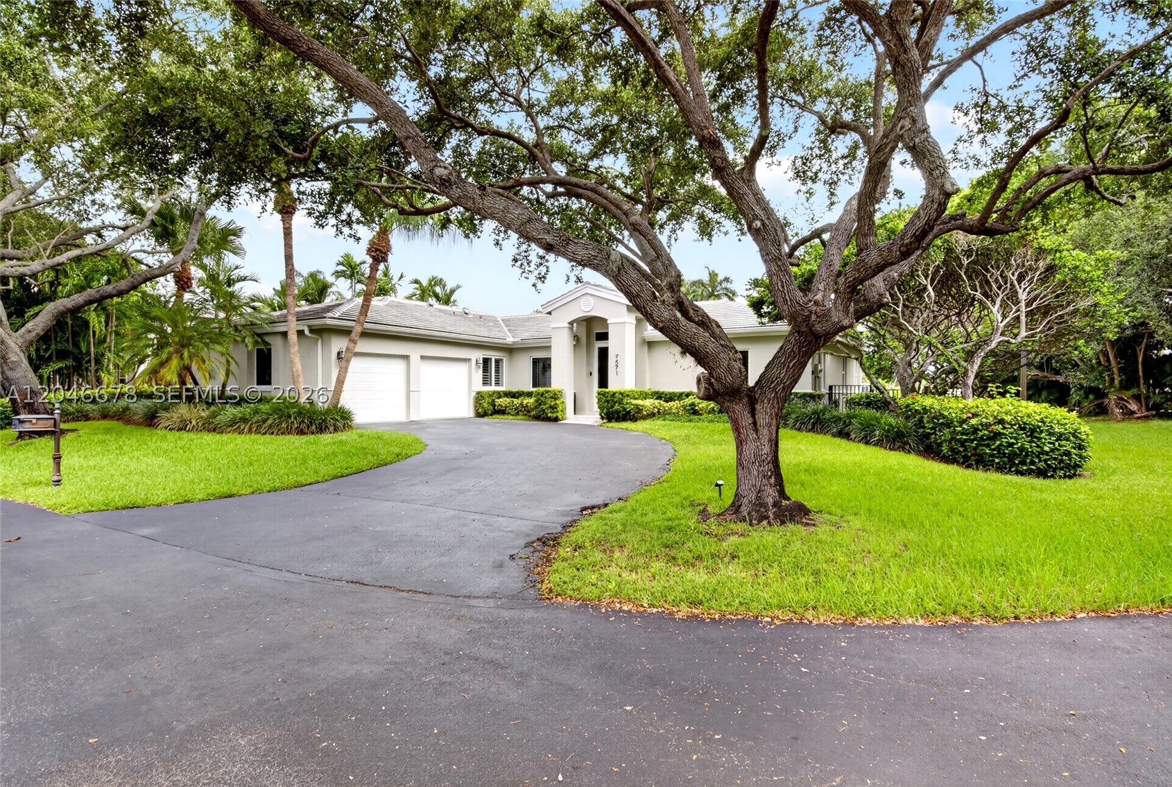 Rare opportunity to own a beautifully maintained canal-front home in Old Cutler Cove, one of the few gated communities in Palmetto Bay. Ideally situated on a private cul-de-sac across from Coral Reef Park, this property offers exceptional privacy with no rear neighbors, situated on a generous 20,313 square foot lot with picturesque canal views from the primary suite, living room, and kitchen. This move-in-ready home features 4 bedrooms, 2.5 baths, soaring vaulted ceilings, abundant natural light, and tile flooring throughout. The spacious primary suite offers a large bath with double sinks, separate Roman tub and shower with two walk-in closets and the room opens to the beautiful backyard, which has room for a pool. The split bedroom plan and large secondary bedrooms make this the ideal floorplan.   Impact doors and windows, a flat tile roof, and numerous thoughtful upgrades provide peace of mind. Recent improvements include a new electrical panel, digital irrigation system, face-recognition smart lock, Nest thermostat, filtered kitchen faucet, custom closets, plantation shutters, aluminum fencing, and a new combination washer/dryer. Spacious two car garage with epoxy flooring. Ideally located near the “A” rated Coral Reef Elementary School, neighborhood parks, and the local farmer’s market. The community is well maintained w/low HOA dues.  Beautiful water views, modern conveniences, and outstanding privacy, this exceptional home is ready for its next owner.