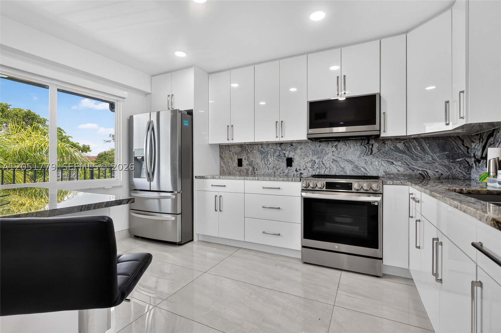 Stunning Remodeled Lakefront Condo in Century Village!
Upgraded Kitchen: Showcases 42-inch acrylic cabinets, quartz countertops, and top-of-the-line appliances. Fully Remodeled Bathrooms: Both bathrooms feature modern upgraded fixtures and sleek sliding glass shower doors. Expanded Living Space: Extended living room offering an ocean-like view over the lake and the iconic 135,000 sq. ft. clubhouse.
Premium Finishes: Equipped with top-of-the-line washer/dryer, stylish zebra blinds/curtains, and full impact windows throughout the unit. Bonus Storage: Fourth-floor unit featuring a private attic for extra storage space.
Resort-Style Amenities & Included Services
Unbeatable HOAs/Condo Fees Include: High-speed internet, cable, water, sewer, exterior insurance, and courtesy bus service operating directly from your building to the clubhouse.
World-Class Clubhouse & Recreation:1,000-seat theater, 25 swimming pools & 20+ active clubs,
 12 pickleball and 15 tennis courts.
Shopping & Dining: Minutes from Pembroke Lakes Mall and the upscale Shops at Pembroke Gardens, plus walking distance to Publix, Walmart, Trader Joe's, local dining, and houses of worship, Just 5 min  from C.B. Smith Park, Memorial Hospital West and 20 minutes from Hollywood Beach.