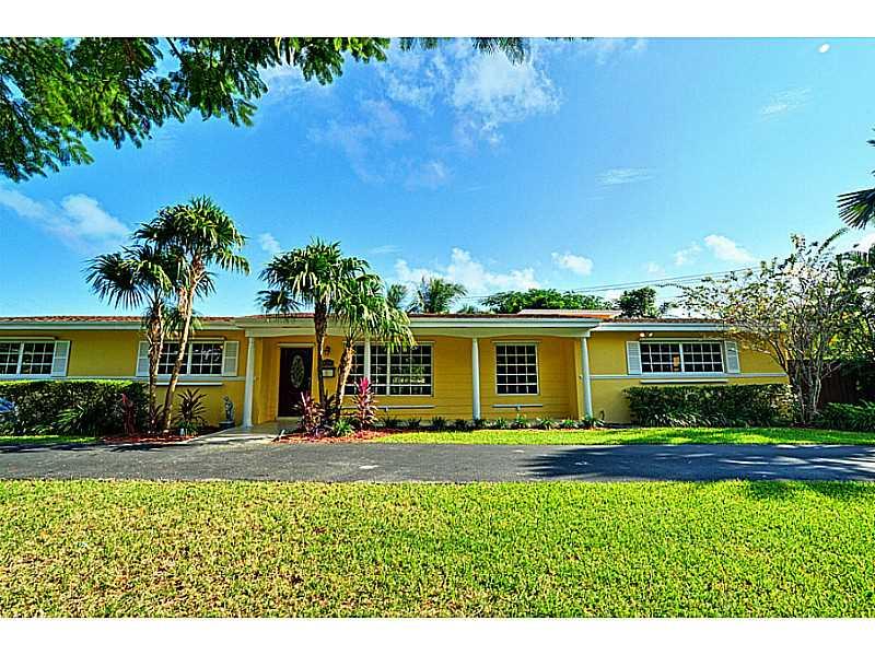 Your own personal oasis in Palmetto Bay. Amazing 4 bedroom 2 bath executive home. Gorgeous corner lot meticulously landscaped & showcased w/accent lighting. Huge dream kitchen w/rich dark wood cabinets, granite counters, & stainless steel appliances open  to large family room.  The open plan that everyone is looking for. Crown molding & separate formal dining rooms incl/designed floor & opens to fabulous pool/patio area for optimal entertaining. Tile floor & wood flooring. 2008 roof & AC. 2 car garage.