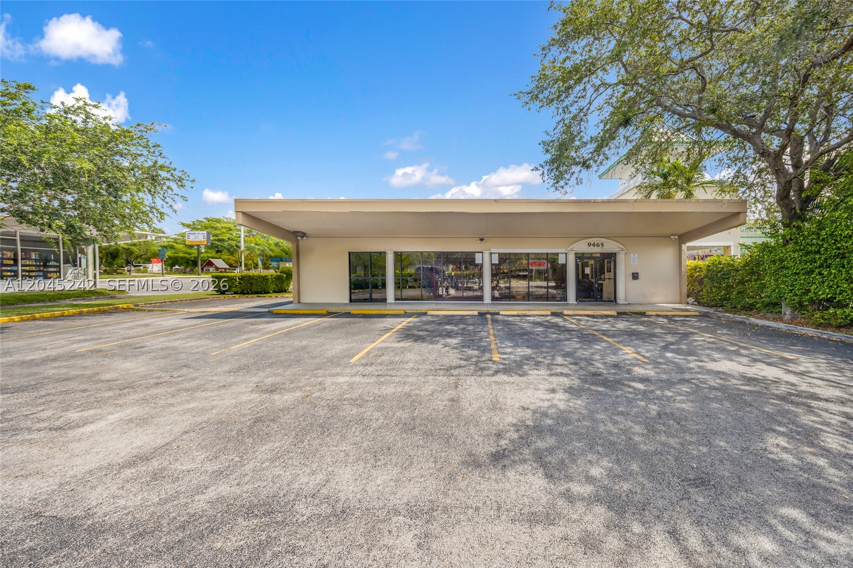 Exceptional opportunity to acquire a centrally located freestanding commercial property with outstanding frontage on SW 56th Street. Zoned BU-1A Business District, the property features a front office/showroom ideal for retail or professional use, complemented by a warehouse in the rear with a loading dock, overhead garage access, and the potential to build a mezzanine for additional usable space. Ample on-site parking and a flexible layout make this property ideal for owner-users, investors, or a variety of commercial operations. Conveniently located within the Urban Center with excellent accessibility to major roadways, surrounding businesses, and dense residential neighborhoods.