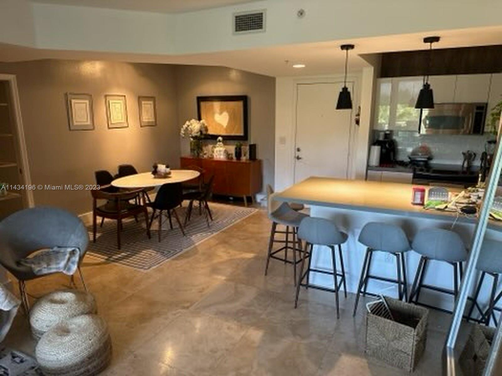 Elevate your lifestyle with this luxurious Aventura city condo. Boasting 2 beds and 2 baths, this exquisite property offers abundant space, sunlight, and upscale features such as a sleek kitchen with quartz countertops and elegant marble floors. Enjoy the convenience of spacious closets, valet parking, and a pet-friendly atmosphere. Dive into relaxation at 4 pools with cabanas, stay fit in the well-equipped gym, and immerse yourself in cinematic experiences in the theater room. The in-unit washer and dryer amplify your daily ease. Nestled near Biscayne Blvd and a quick bridge to Sunny Isles Beach, it boasts a prime location. Stroll to the prestigious Aventura Mall or swiftly access the nearby I-95 expressway. Enjoy the new BRIGHTLINE train station a few steps away, ensuring easy commuting.