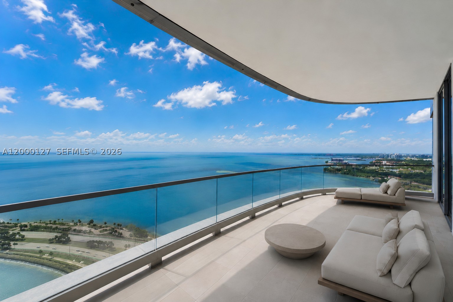 Welcome to the best in waterfront living. Residence 3602 at UNA Residences is not just a home; it is a masterwork of light, water, and architectural precision. Positioned on the highly coveted Southeast Premier corner, this 36th-floor residence captures the essence of the Miami lifestyle. From the moment your private elevator opens into your personal foyer, you are greeted by the shimmering expanse of Biscayne Bay and the Atlantic Ocean stretching toward the horizon. Designed by Adrian Smith + Gordon Gill Architecture, every inch of this home is inspired by the sleek, organic curves of classic Italian wooden yachts. Featuring 4BRs, 4.5BAs, and a powder room, each space is designed with floor-to-ceiling high-efficiency glass and direct access to outdoor areas. The corner layout offers an open-concept Great Room filled with natural light and showcases 270-degree views of the coastline and South Brickell. A signature 10FT deep outdoor living room with seamless glass railings is designed for effortless entertaining against a backdrop of water & skyline views. The kitchen is outfitted with professional-grade Gaggenau appliances, including an induction cooktop, wine cooler, and integrated custom cabinetry. From 24-hour concierge and valet to dedicated white-glove service, every detail is thoughtfully curated. Residents also enjoy an Aman-inspired spa with indoor & outdoor treatment rooms, steam and sauna, and a state-of-the-art fitness center with yoga & personal training studios.