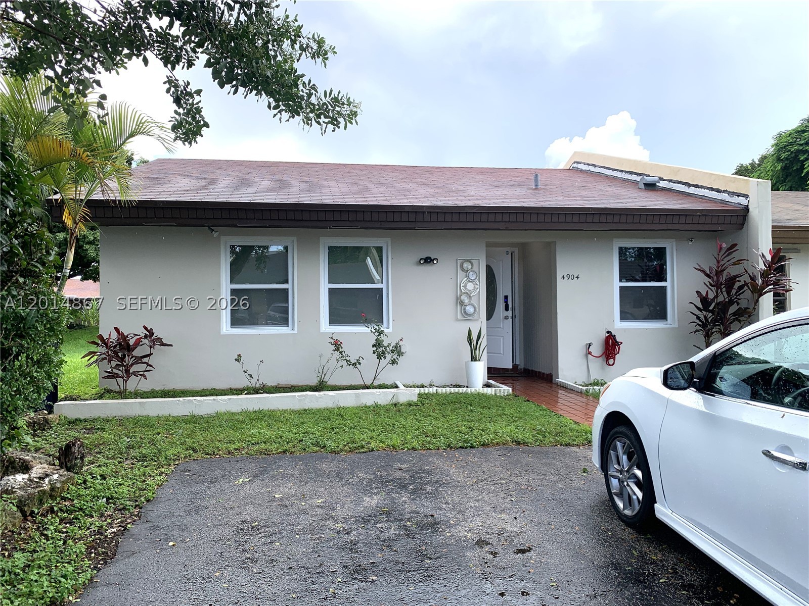Welcome to this charming 2-bedroom, 2-bathroom corner villa in the desirable Bent Tree neighborhood. Located in a peaceful and well-maintained community, this home offers a functional layout with a kitchen that includes the convenience of an in-unit washer and dryer. Enjoy outdoor living on the partially covered patio, perfect for pets and entertaining. Plus, with two parking spots directly in front, convenience is key. Ideally located near Bent Tree Elementary, Bent Tree Park, and just minutes from local dining, shopping, and schools, this villa is the perfect blend of comfort and convenience. Roof was replaced in 2021-2022.