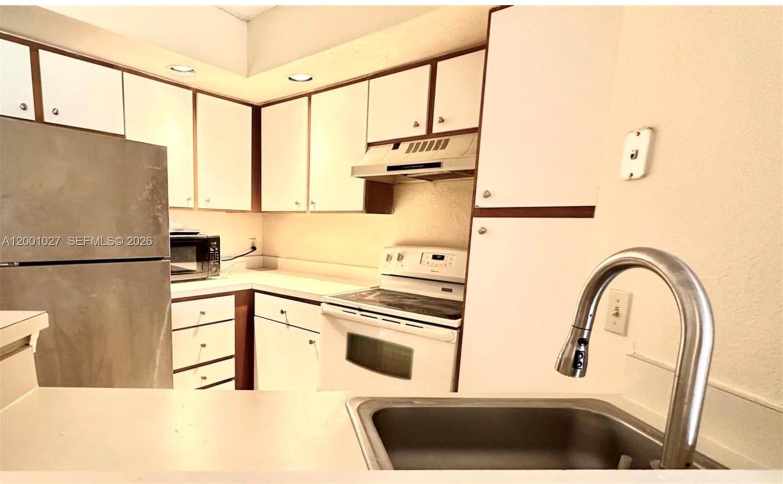 Welcome to this well-maintained condo in a convenient Margate location! This unit offers a comfortable and functional layout with bright living and dining areas that create a warm, inviting atmosphere. The kitchen provides ample cabinet space and is designed for everyday ease. The primary bedroom is generously sized with good closet storage,.

Located on an upper floor, the unit provides added privacy and a pleasant setting to enjoy your living space. The community is professionally managed and includes an HOA.
Conveniently situated near major roadways, shopping, dining, and everyday essentials. Assigned and guest parking may be available per association guidelines.

Great opportunity for a primary residence or investment in a well-located Margate community.