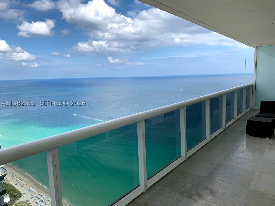 Enjoy the Spectacular views of the Ocean, City, and Intracoastal from the wrap-around huge terrace at floor 46. This corner unit has marble floor throughout entire unit, Italian glass doors, custom lights, window treatments, custom rosewood walking closets, steam shower in the second bathroom in the redesigned toilet, sink and shower. You can also access all the 5 star amenities such as a two-story exercise room, a spa, a sauna, a steam room, 3 pools, bar with pool service, and 24 hour concierge and valet parking. This unit can be rented 12 times per year, with a minimum rental period of 30 days, this makes the property very attractive for investors, especially with the upcoming World Cup in the US.