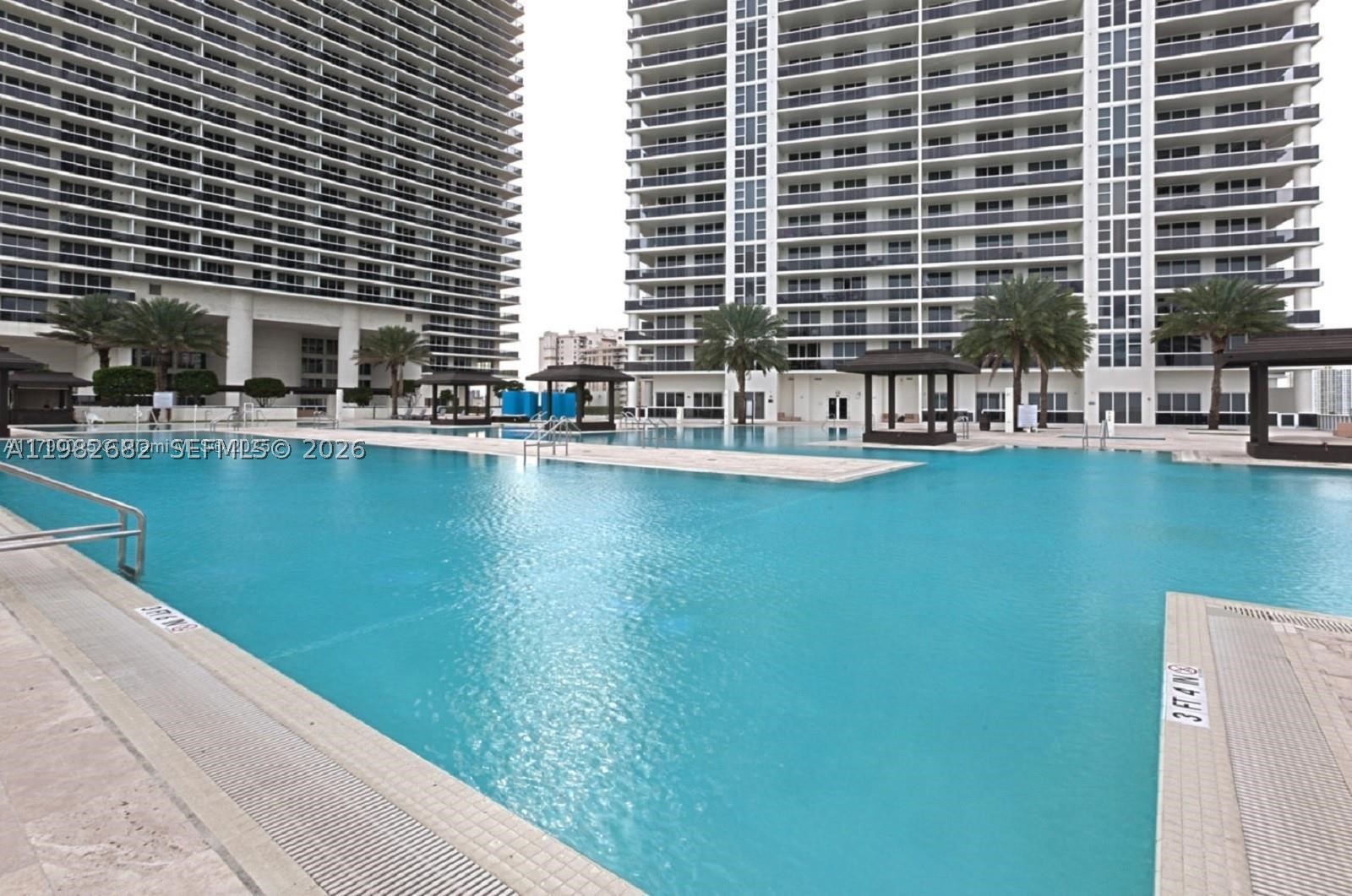 Enjoy the Spectacular views of the Ocean, City, and Intracoastal from the wrap-around huge terrace at floor 46. This corner unit has marble floor throughout entire unit, Italian glass doors, custom lights, window treatments, custom rosewood walking closets, steam shower in the second bathroom in the redesigned toilet, sink and shower. You can also access all the 5 star amenities such as a two-story exercise room, a spa, a sauna, a steam room, 3 pools, bar with pool service, and 24 hour concierge and valet parking. This unit can be rented 12 times per year, with a minimum rental period of 30 days, this makes the property very attractive for investors, especially with the upcoming World Cup in the US.