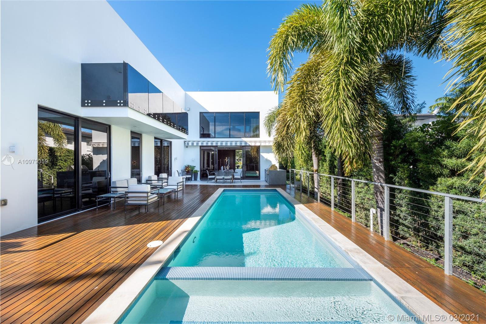 Tropical modern paradise with stunning curb appeal, secluded with high hedges and located on prestigious Lower North Bay Road - only minutes to the Sunset Harbour neighborhood and Lincoln Road! Built in 2014, this 4-bed 3.5-bath luxury home features beautiful modern architecture with secluded backyard with a heated pool, spa tub, and summer kitchen. Inside, open floor plan, living room with double height ceilings, chef’s kitchen with a cooking island, and formal dining. 1-bed downstairs, 3 beds plus landing/office area upstairs. Master suite has luxurious bath, walk-in closet, and a private terrace overlooking the pool. Gated home with 1 car garage with a lift, driveway, and full house generator. Experience living on Miami Beach’s most exclusive street, North Bay Road.