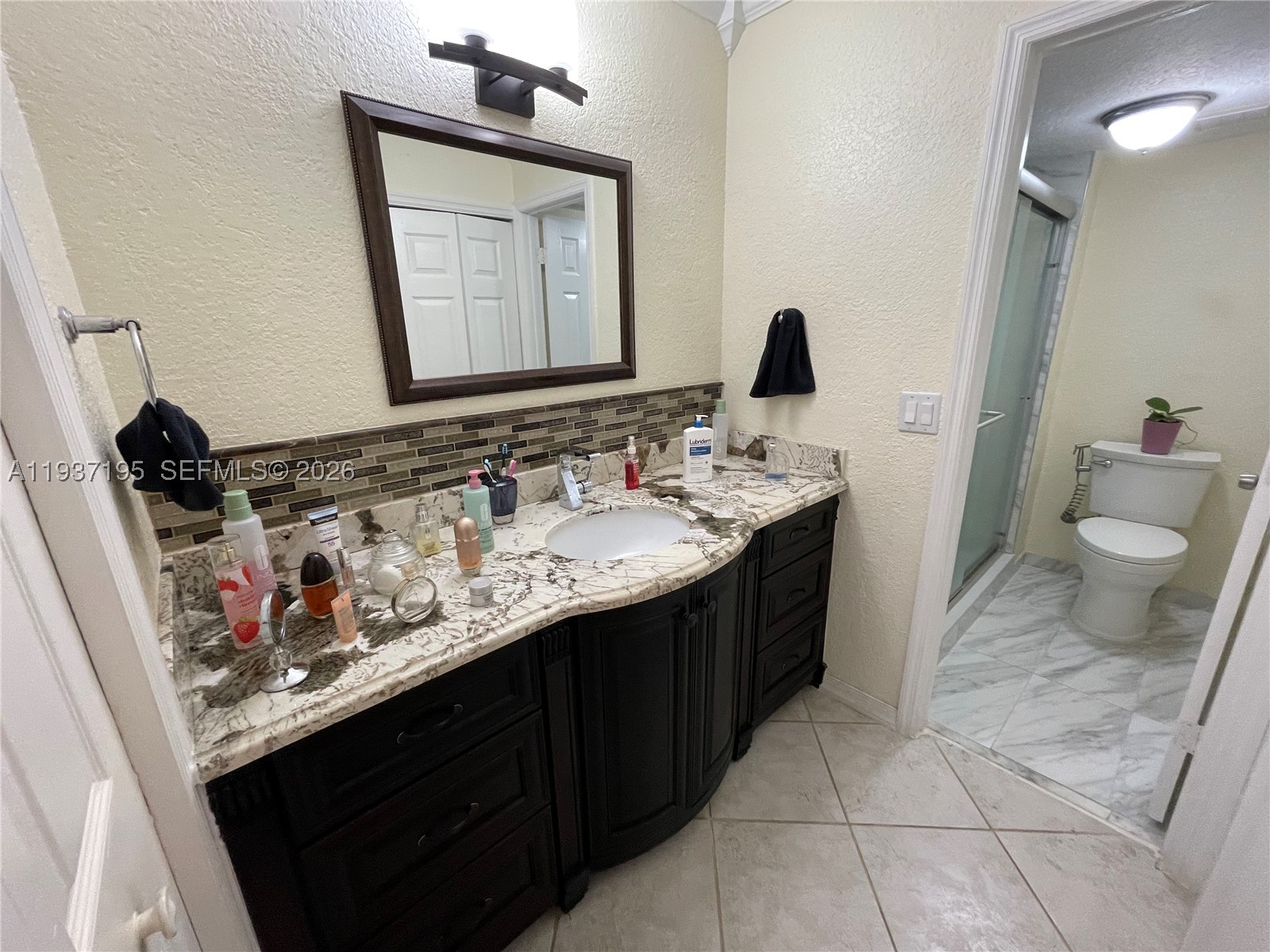 SADDLE CLUB GARDEN APTS - Residential