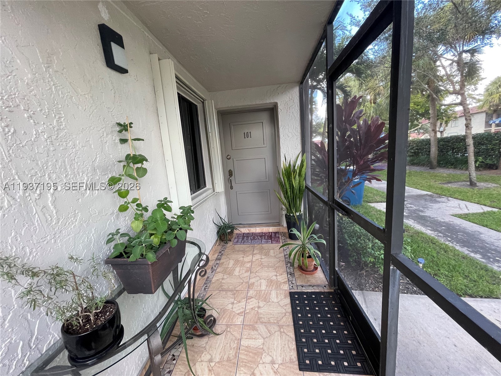Spacious and comfortable Corner Unit on the ground floor of 2 beds, 2 baths in the in a highly desirable Weston community. It features a large living dining area, good sized bedrooms, Wooden closets, kitchen with Stainless steel appliances in good conditions, new refrigerator and granite countertops. Washer and Dryer inside. Tile floors throughout the property. Hurricane shutters, Private screened-in front and back Porch ideal for relaxing. Charming Unit with view of the garden, near the pool. The surrounding area offers lush vegetation, and leafy trees. Provides easy access to excellent schools. Near Weston Road, expressways, shopping and entertaining. Includes 1 assigned parking space with additional parking available in front (max. of 2 cars per unit). Monthly ASSOCIATION FEE INCLUDES: Insurance, Roof Repairs, Water, Cable & Internet. Association requires a minimum credit score of 700. NO SPECIAL ASSESSMENTS DUE. With rights to the Bonaventure Town Center Club and all of its amenities: billiards room, gym, sauna, basketball courts, business center, children's playground, clubhouse/social lounge, library, pickleball, swimming pool, spa/jacuzzi, tennis courts, and other amenities. Very cozy community, come and see it, don't miss your chance to live in Weston.