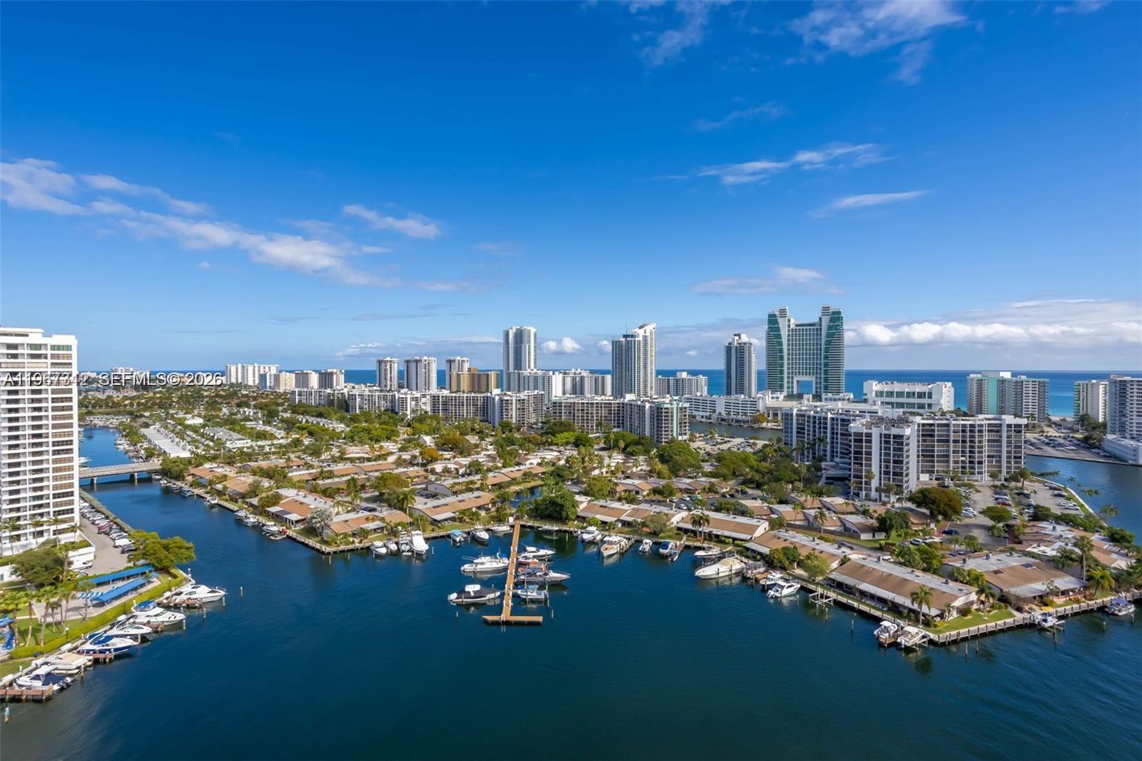 Motivated Seller!!! Stunning penthouse offering endless, unobstructed views of the ocean and Intracoastal Waterway. Completely remodeled with high-end finishes throughout. Open-concept layout filled with natural light and designed for easy living and entertaining. The gourmet kitchen features stainless steel appliances, wine cooler, custom faucet, and ample counter space. Porcelain flooring throughout the unit. Modern recessed (high-hat) lighting, newer doors and vents, and a newer electrical panel add to the home’s sleek, updated design. Spacious primary suite includes two custom walk-in closets and a luxurious bathroom with dual sinks, dressing vanity, and jacuzzi tub/shower. Guest bedroom offers an oversized walk-in closet, and the guest bathroom is fully upgraded. Enjoy spectacular water views from every room and the private balcony, equipped with electric hurricane shutters for convenience and peace of mind. Separate laundry room with LG front-loading washer and dryer with pedestals. Additional features include two assigned parking spaces, easy walk across the bridge to the beach, and community boat slip access. A rare opportunity to rent a turnkey penthouse offering luxury finishes, incredible views, and the ultimate South Florida lifestyle. Building passed 40 year inspection.