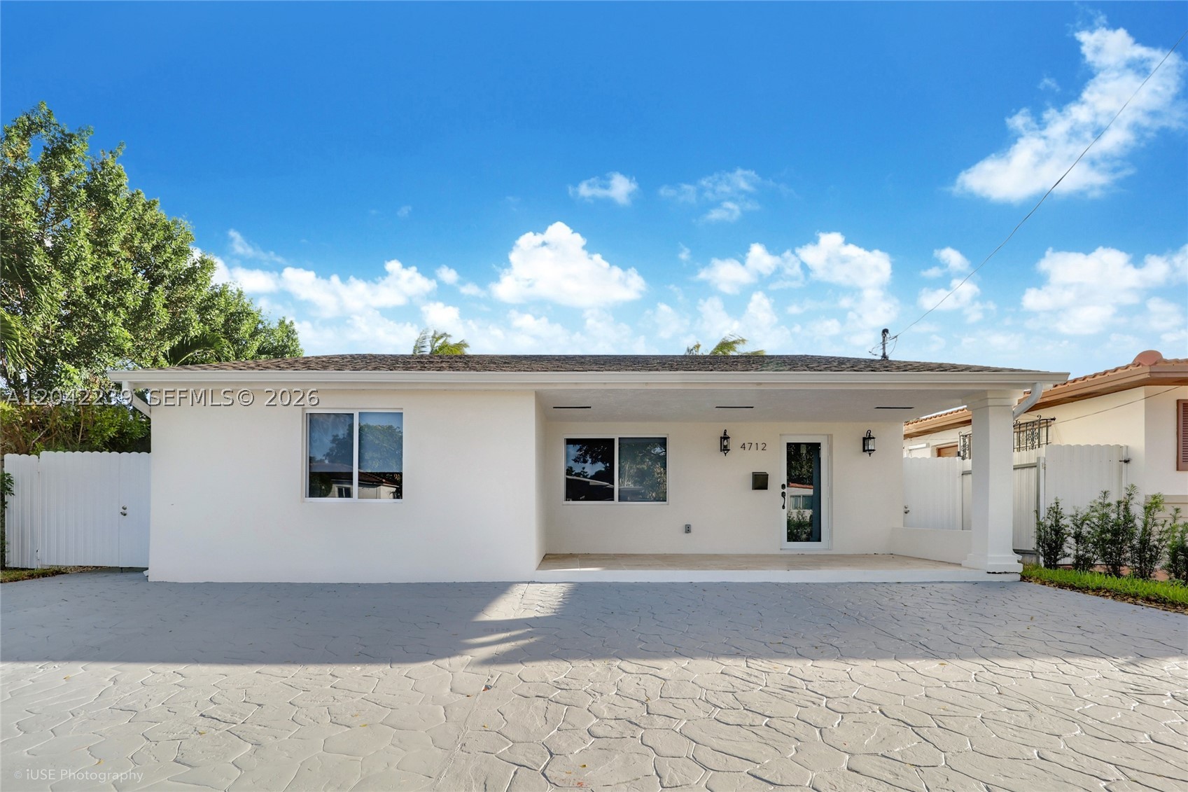 Completely renovated home located in the Flagami Neighborhood, 10 minutes from Miami International Airport, a few blocks away from the entrance of Coral Gables, 15 minutes to Brickell and Downtown, and 15min from Wynwood and the Design District, close to Jackson Memorial Hospital and Calle 8 with plenty of Supermarkets close by. New roof, new high impact hurricane proof windows, new floor, new kitchen, and new baths, new custom closets. The property has also 2 full bathrooms plus a half bath, large open floor plan, plenty of space to park several cars in the driveway, backyard with custom artificial grass, enjoy central Miami living in this quiet neighborhood. **Closets have been Built Out, not shown in the pictures, also backyard has artificial grass.