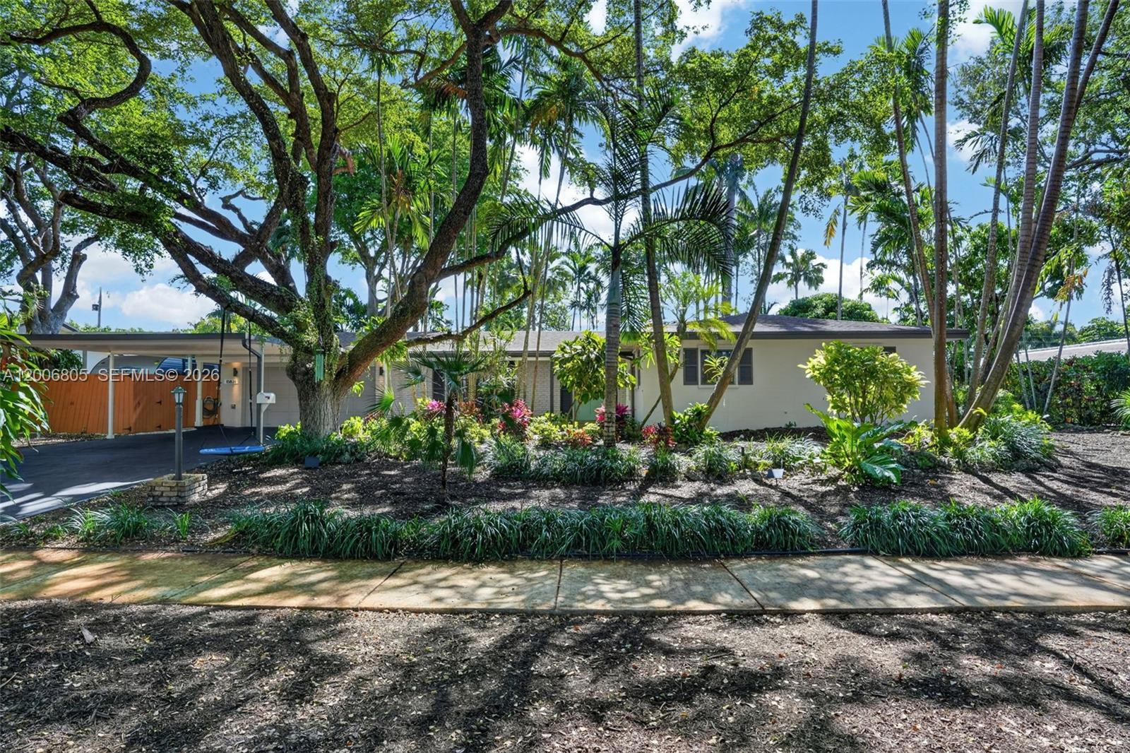 Beautifully maintained 3-bedroom, 2-bath home located on one of the nicest, quiet, tree-lined streets in Palmetto Bay. From the moment you arrive, you feel the peace and privacy this setting offers, surrounded by mature landscaping and a true tropical atmosphere.

The home features 1,898 adjusted sq ft (2,579 total) with a comfortable layout that has been well cared for over the years, including a newer roof (2023).

The backyard is where this home really stands out. An oversized 518 sq ft terrace is perfect for relaxing or entertaining, overlooking a lush yard with a beautiful koi pond that creates a calm, inviting space. There’s also plenty of room for outdoor living and enjoying Miami’s lifestyle year-round.

Additional features include a 2-car garage, grandfathered 2-car carport, and space for an RV or boat.

Close to top-rated schools, parks, and everyday conveniences.
