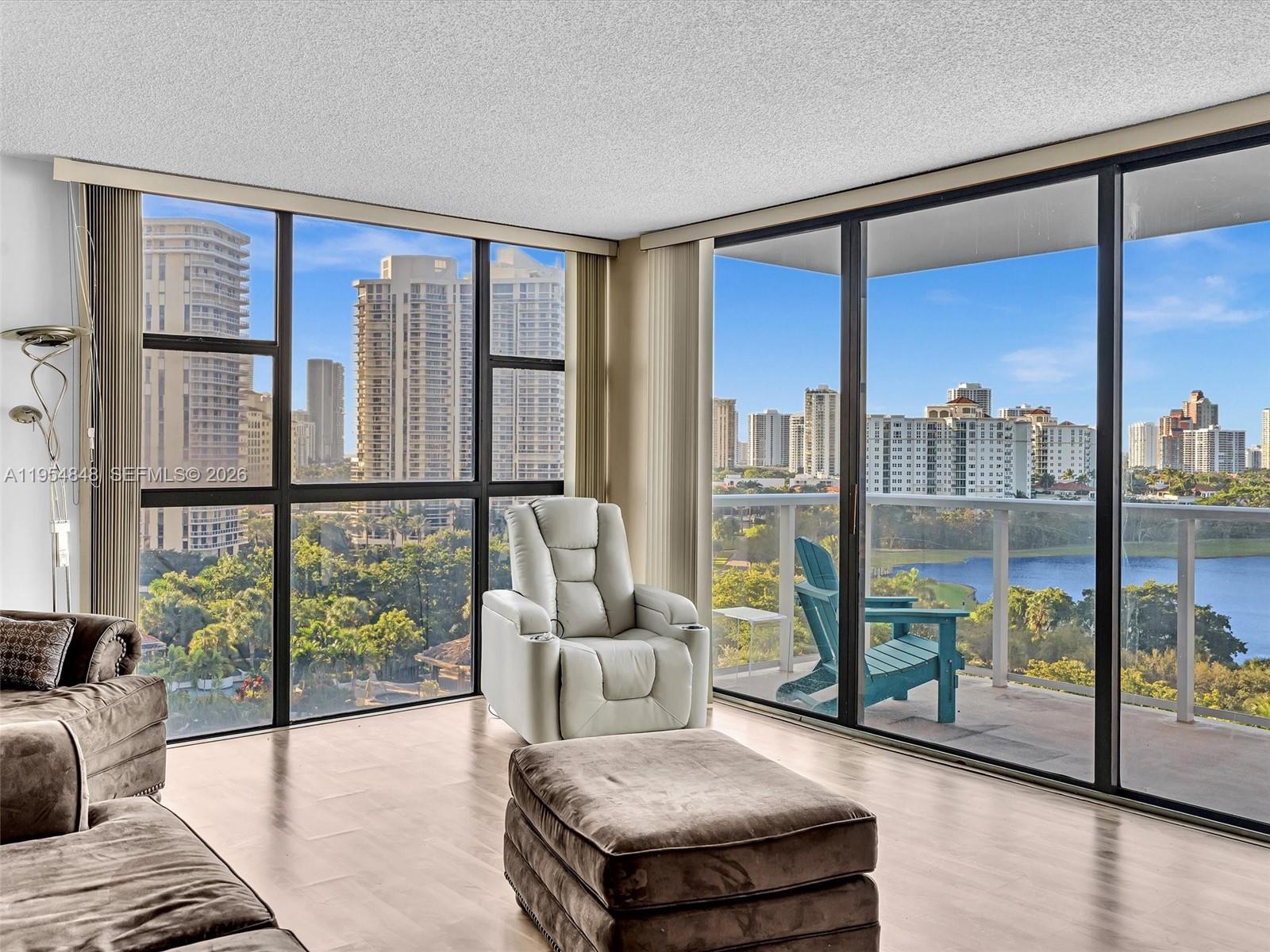 Corner unit at Flamenco Towers! This bright 2/2 features 1,144 SF of potential, wrapped in floor-to-ceiling light with stunning canal and golf course views. Ready for personal touch.