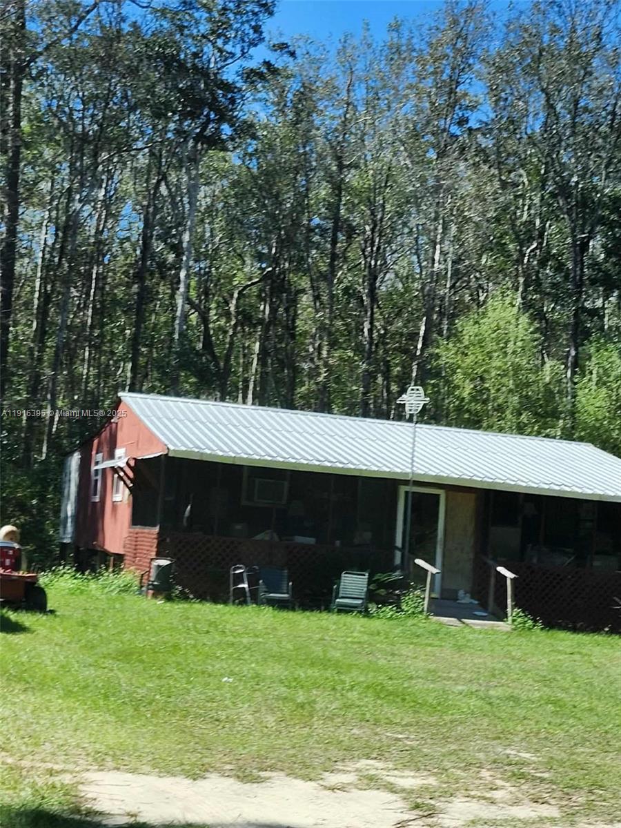 Excellent Opportunity To Own Off the Choctawhatchee River,
This property is only 1 turn away from the Brand New Nature View Subdivision on hwy 3280 in booming Freeport Fl. Imagine the investment opportunity owning almost 4 acres of land almost joining Nature View for this price that also joins Northwest Florida Land Management. Not to mention the Choctawhatchee River is at the end of the road featuring a nice, paved boat ramp, plenty of hunting, fishing, and privacy.  This property is being sold as VACANT LAND. The cabins are being left as a GIFT to the new buyers and are given NO VALUE. This property conveniently already has 2 power poles, a well and 2 separate addresses. Pole barn on property is of no value.