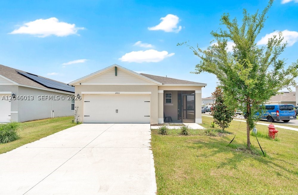 Charming corner-lot home in Eagle Hammock! Built in 2023, this 3-bed, 2-bath, 1,629 sq ft home offers a 2-car garage, ceramic tile throughout (carpet in bedrooms), and a fully equipped kitchen with stainless steel appliances. Enjoy screened front and back patios plus a nice green backyard, perfect for Florida living year-round.
Eagle Hammock offers a clubhouse, pool, playground, and walking trails for a low $100/year HOA. Conveniently located near Winter Haven and Lakeland, less than an hour from Orlando and Tampa.
Corner lot. Don't miss this one!