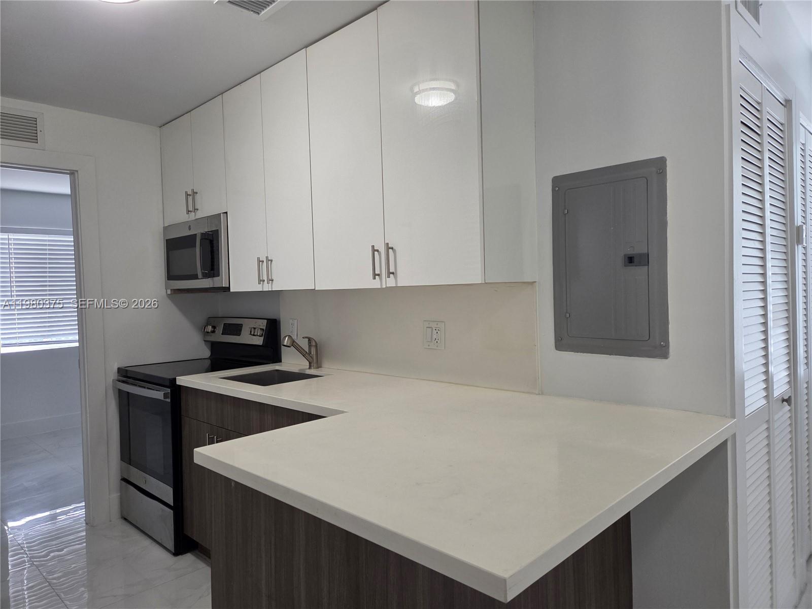 Renovated fully equipped 1 bedroom 1 bathroom unit, luxurious modern finishes throughout. Central AC, washer/dryer in unit, quartz style counters, stainless steel appliances, beautiful white tile floors. Building is a remodeled, fenced in, gated 4 plex. Square footage is an estimate / approximate at 538. Minutes from Wynwood and Downtown Miami. Professionally managed. *USPS mail delivery is pending final confirmation- mailbox is installed but we are waiting on verification from USPS; see broker remarks or ask listing agent.