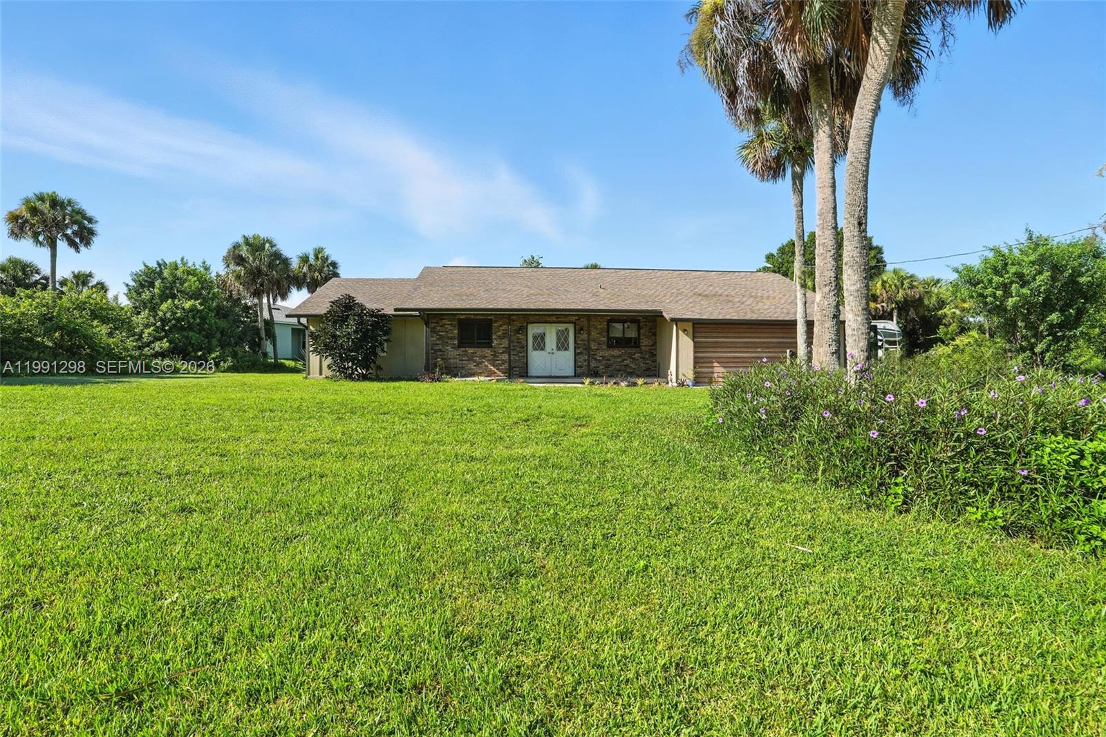 WELCOME TO A HOME THAT BLENDS COMFORT, CHARM, AND THE EASY PACE OF PORT LABELLE LIVING! Step onto the inviting front porch and picture quiet mornings with coffee as the sun warms the manicured lawn. Inside, the private kitchen with seating is perfect for casual meals or lively conversations, while the spacious den offers flexibility for work or relaxation. Three bedrooms and two-and-a-half baths provide room for everyone, and the screened back lanai becomes your personal retreat for evening breezes and starlit nights. Set on .32 acres, there’s space to garden, play, or simply enjoy Florida’s year-round sunshine. Living in Port Labelle means access to peaceful streets, nearby parks, boat ramps, and a strong sense of community—yet you’re just a short drive to shopping, dining, and the Caloosahatchee River. DON’T MISS YOUR CHANCE TO MAKE THIS SLICE OF FLORIDA YOUR OWN!