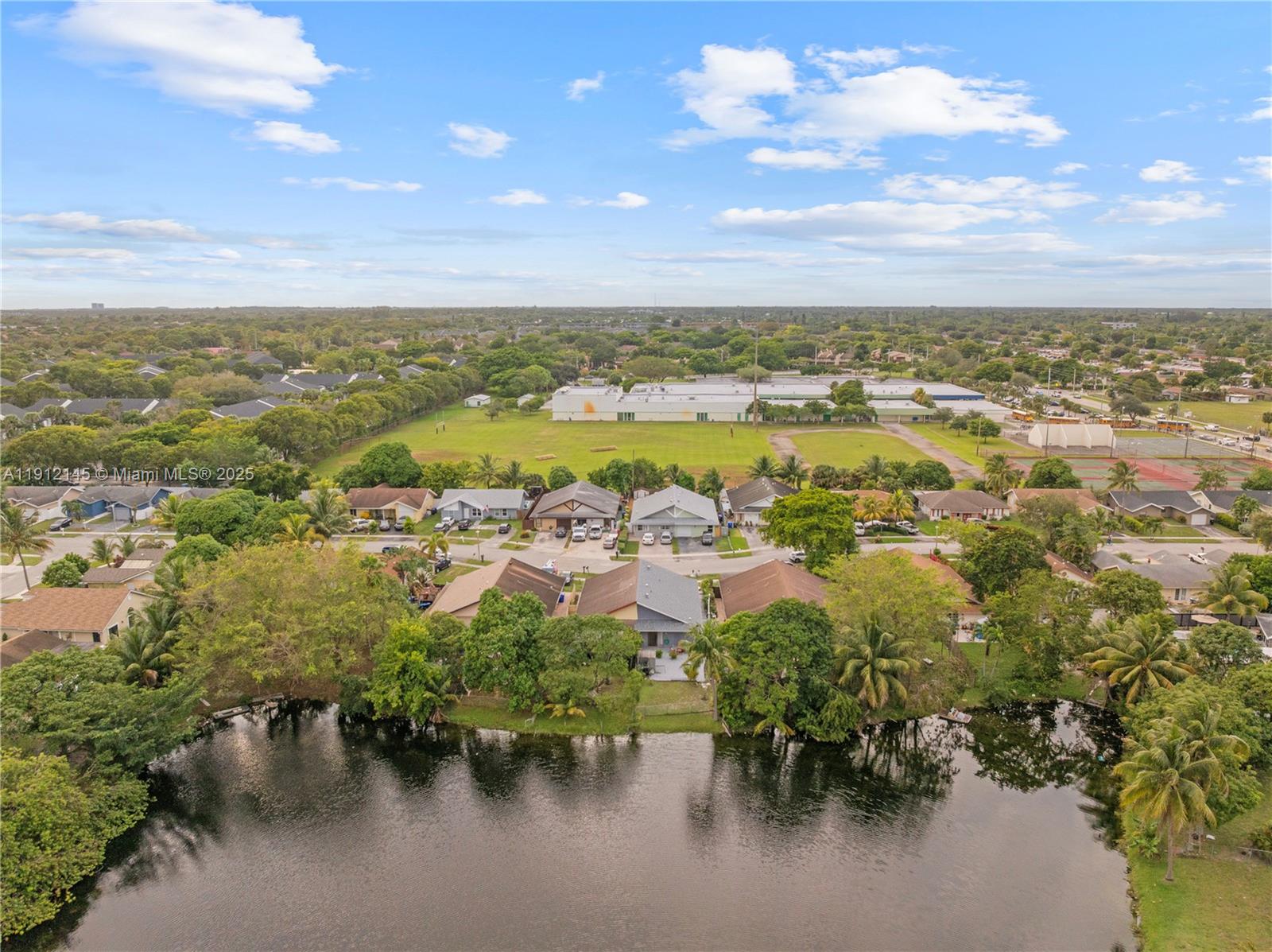 Beautiful 3/2 single-family attached home with no HOA and direct lake access!
This spacious and cozy property features a newly installed roof, A/C, and electrical panel. Enjoy a bright, open layout with comfortable living spaces and a serene backyard overlooking the lake—perfect for relaxing, entertaining, or weekend gatherings.  
A rare opportunity to own a move-in-ready home with no HOA, and no restrictions. Definitely a must-see!