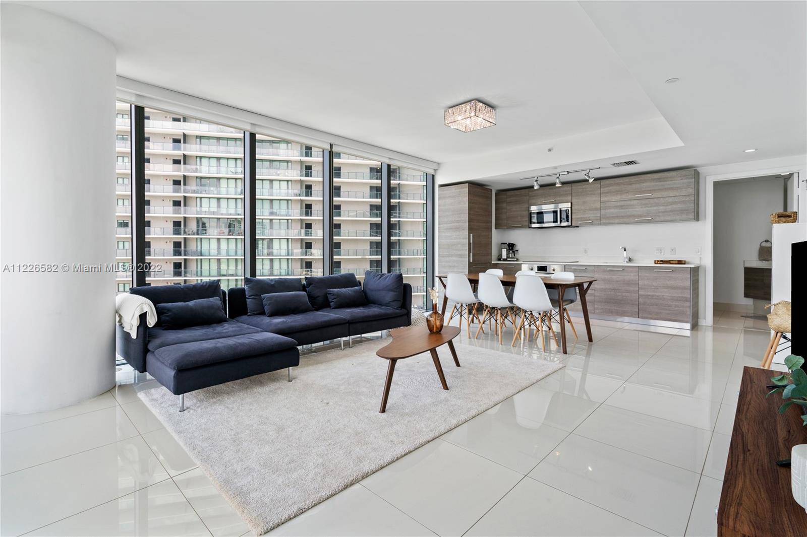 Beautiful corner residence with an abundance of natural light, and beautiful views of the Bay in Edgewater. This 1 bed/ 1.5 unit features floor-to-ceiling glass windows, 9 ft ceilings, Italkraft kitchen cabinetry, Bosch appliances, quartz countertop, shades & blackouts, and a private foyer. The unit is in great condition, ready to move in. A full-service building Paraiso Bay offers several amenities including tennis courts, a luxury health spa with sauna & steam room, a resort-style pool, fitness center, cinema, wine cellar, party room, pedestrian-friendly street, and 24-hour security, front desk, & valet. Paraiso Bay is centrally located minutes away from the Miami International Airport, the Design District, Wynwood, Miami Beach & Brickell to name a few. Fully furnished unit.