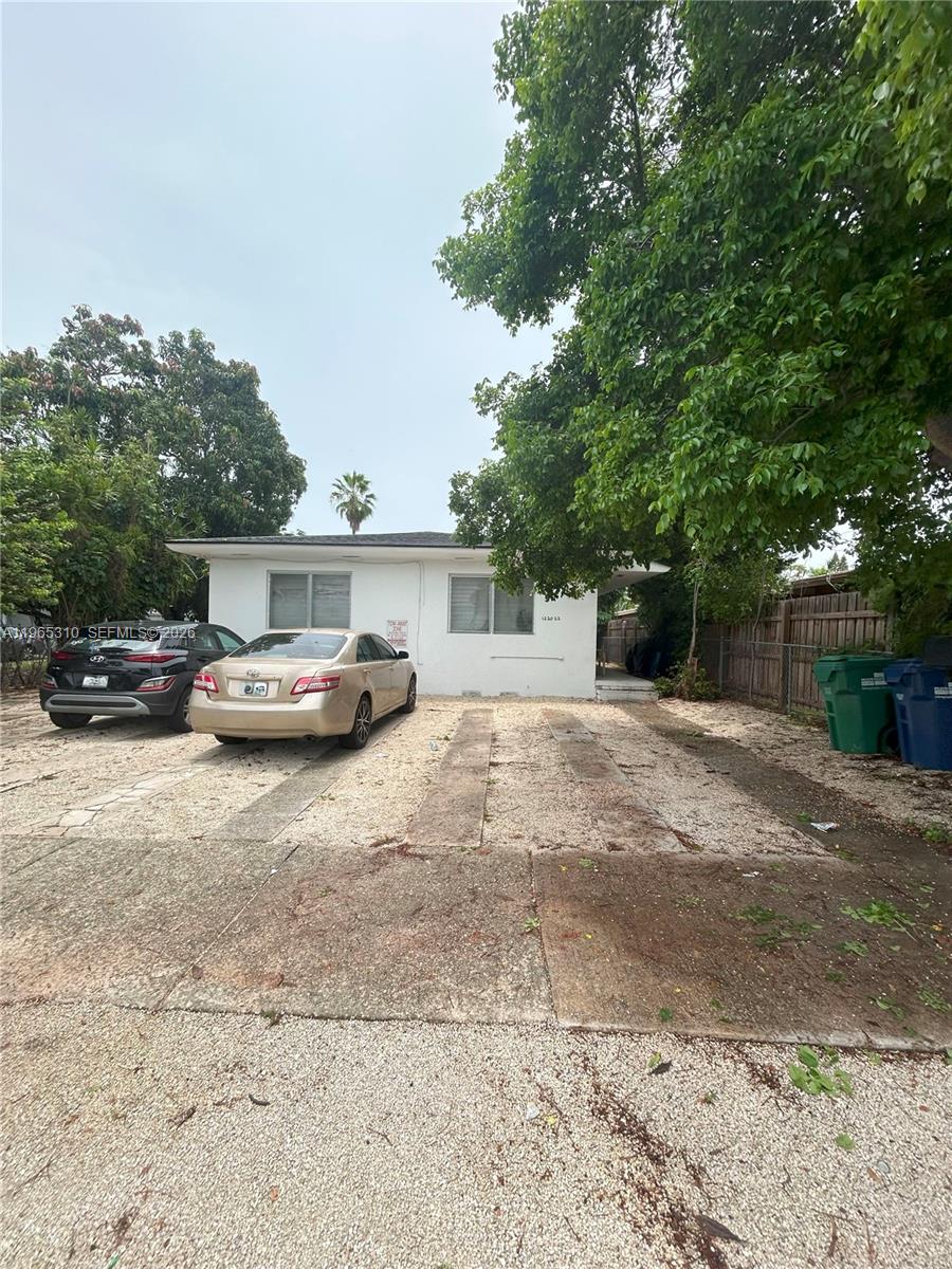 Rare opportunity to own a fully legal 3-unit triplex in a highly desirable Miami location near Biscayne Blvd, offered at $749,000 — approximately $250K per unit. This income-producing property features two 2/1 units and one fully renovated efficiency. One 2/1 is currently vacant and was previously renting for $1,850/month until September 2025 and is now actively marketed at $1,850. The second 2/1 is rented month-to-month at $1,750/month, and the renovated efficiency is leased at $1,395/month through August 31, 2026 with option to renew. The property is cash flowing from day one with strong in-place income and additional upside potential. If the two 2/1 units are renovated, there is a clear opportunity to further increase rents and maximize returns, making this an attractive value-add investment. Expenses are estimated at approximately $8,000 per year. All units are separately metered with tenants paying their own electricity. Water is included up to $75 per month, with any overage split among tenants. Prime central location surrounded by shopping centers, restaurants, businesses, and just minutes to Downtown Miami, beaches, and major highways, offering strong rental demand and long-term appreciation potential.