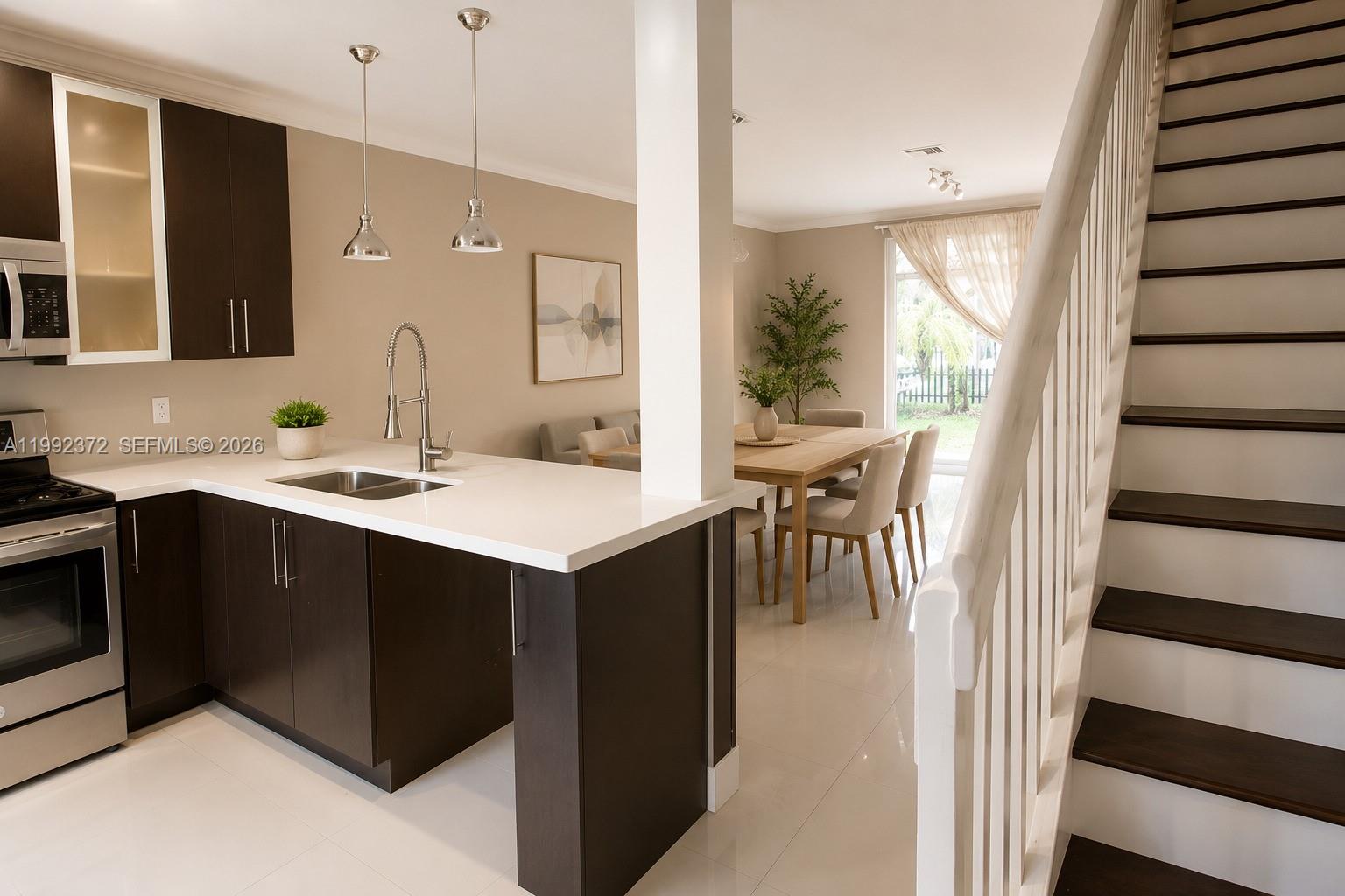 Completely remodeled from kitchen to bathrooms and flooring. This beautifully updated home features new baseboards and crown molding on the main floor, elegant Italian sinks in the bathrooms, and brand-new appliances. Tastefully upgraded throughout. Won’t last!