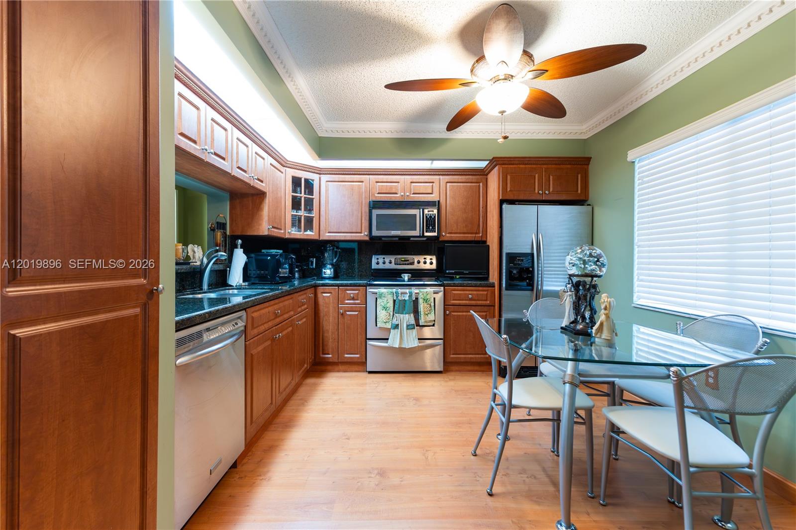 Welcome home to this bright and beautiful 1-bedroom, 1.5-bathroom unit. The open-concept living and dining area is filled with natural light pouring in from the balcony, seamlessly connecting to a kitchen equipped with wood cabinetry, stainless-steel appliances, and an in-unit washer/dryer. Located in the area's premier 55+ community, you will enjoy resort-style amenities designed to keep you socially and physically active.