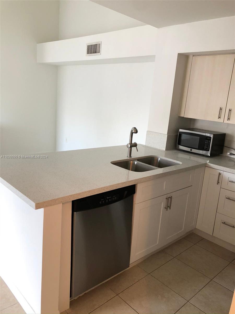 DEVONAIRE CONDO AT PEMBRO - Residential