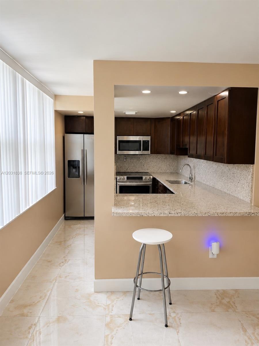 TANGERINE CONDOMINIUM TWO - Residential Lease
