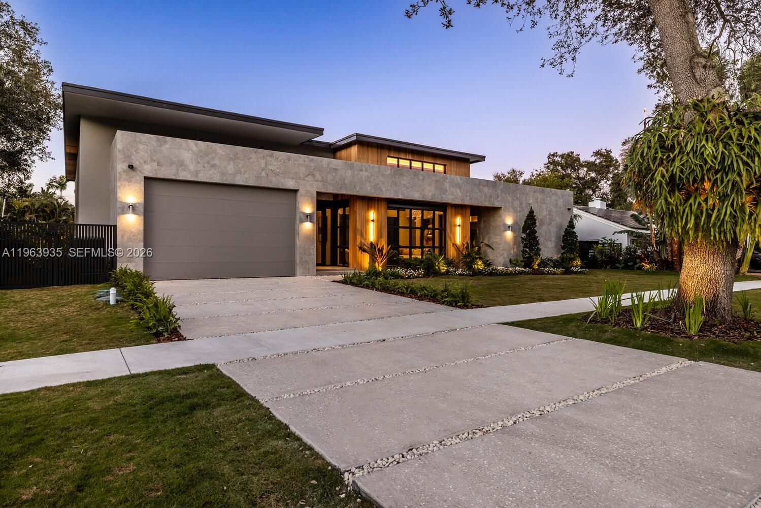 A statement of modern elegance, The Atrium House introduces a rare architectural experience in the heart of Miami Shores. This newly built estate offers 5 bedrooms, 6.5 baths, and over 7,800 total sq ft on a 14,300 sq ft lot. A striking central atrium fills the residence with natural light, anchoring expansive living and dining spaces that flow seamlessly into a chef’s kitchen designed for elevated entertaining. All bedrooms feature en-suite baths, complemented by a cabana bath and refined powder room. Outdoors, enjoy a resort-style pool, summer kitchen, and covered terraces. Prime location near Miami Shores Country Club, parks, and top schools. No flood zone.