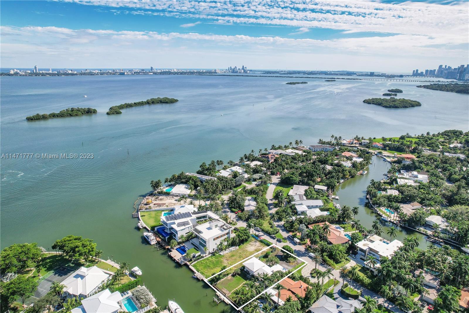 HIGHLY SOUGHT AFTER BELLE MEADE ISLAND HOME ON LARGE WATERFRONT LOT WITH 75' CANAL FRONTAGE AND ONLY THREE LOTS FROM BISCAYNE BAY. VINTAGE 1953 SPLIT-LEVEL DESIGN. 12,300 SQ. FOOT LOT OFFERS GREAT OPPORTUNITY TO BUILD A LARGE HOME WITH DIRECT BAY ACCESS AND STUNNING BAY VIEWS. GATED ENTRANCE TO BELLE MEADE COMMUNITY AND SECONDARY GATED ACCESS TO BELLE MEADE ISLAND. GREAT LOCATION CLOSE TO MIAMI DESIGN DISTRICT, MIAMI BEACHES, BAL HARBOR SHOPS AND MORE. EASY TO SHOW.