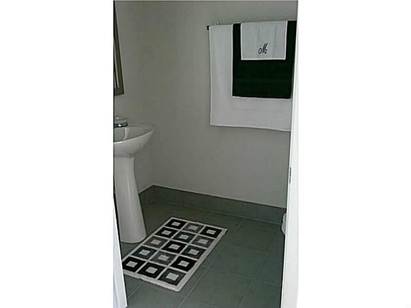 MINT CONDOMINIUM - Residential Lease