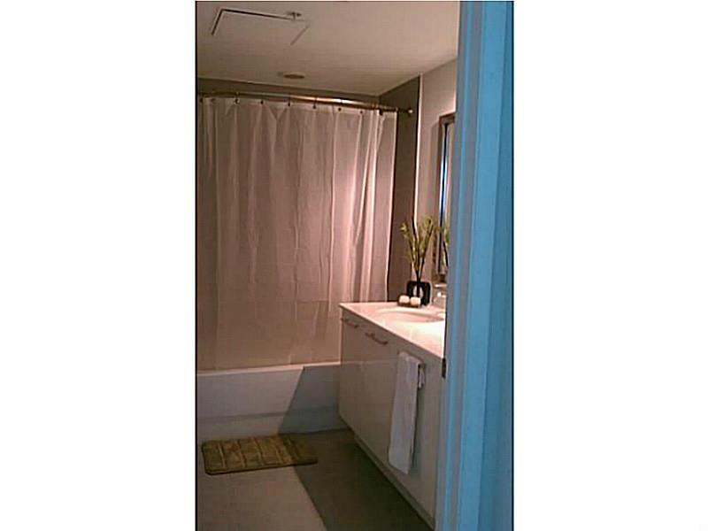 MINT CONDOMINIUM - Residential Lease
