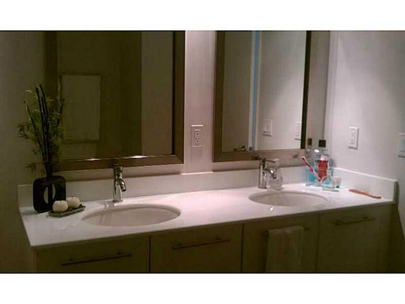 MINT CONDOMINIUM - Residential Lease