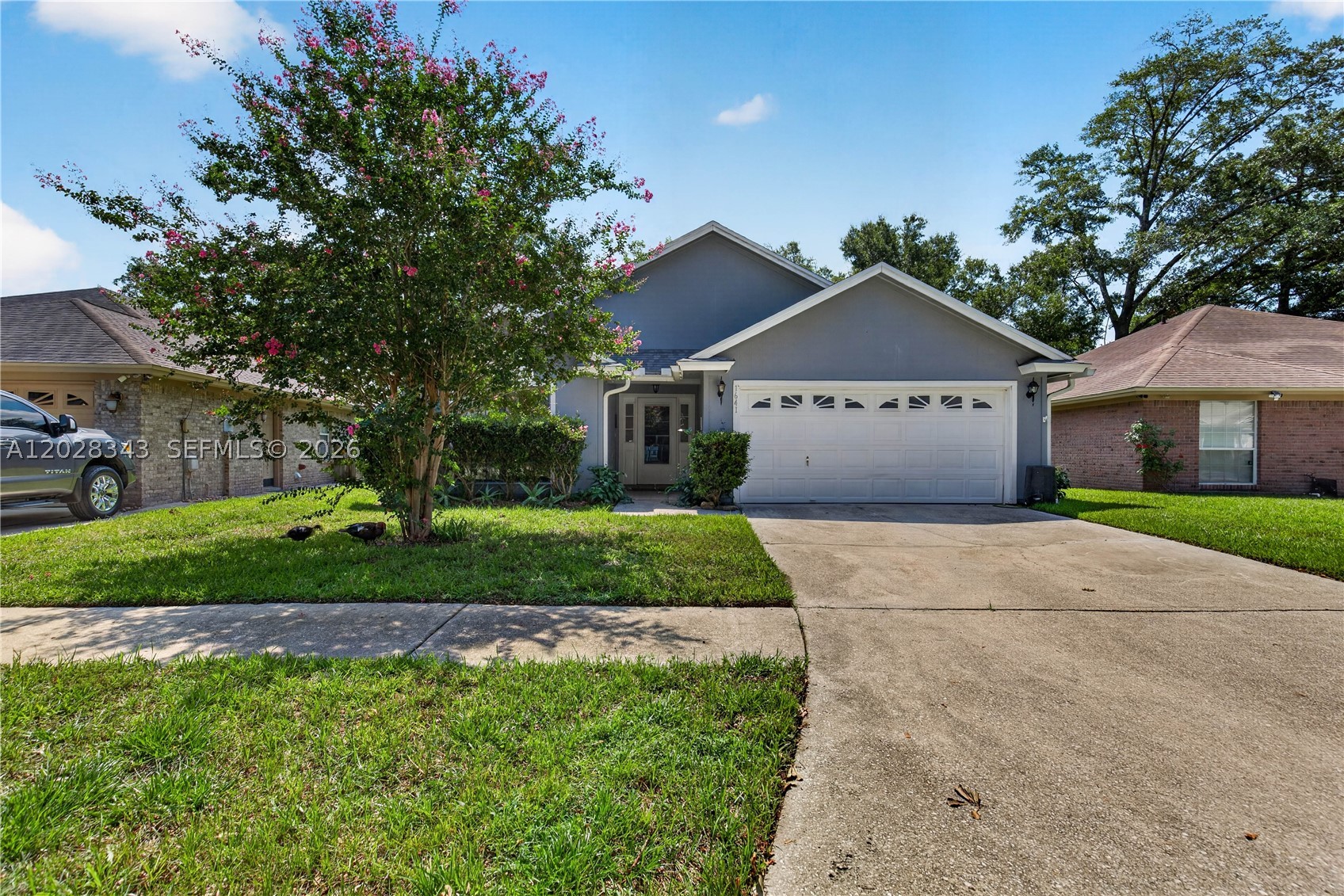 Wake up to tranquil lake views and breathtaking sunsets from the comfort and privacy of your own home. This fabulous single-family residence features 4 bedrooms, 2 bathrooms, and a 2-car garage offering the perfect blend of space, style, and functionality. The thoughtfully designed interior boasts a bright, spacious kitchen, formal living and dining areas, and a warm family room with a fireplace. Soaring high ceilings enhance the sense of openness throughout, while laminate wood flooring adds elegance to the main living areas and plush carpeting provides comfort in the bedrooms. A dedicated laundry closet with a full-size washer and dryer adds everyday convenience. Nestled on a quiet cul-de-sac, the home is ideally situated with easy access to major roadways, top-rated schools, shopping, and a wealth of local amenities. A rare opportunity — don't let it pass you by!