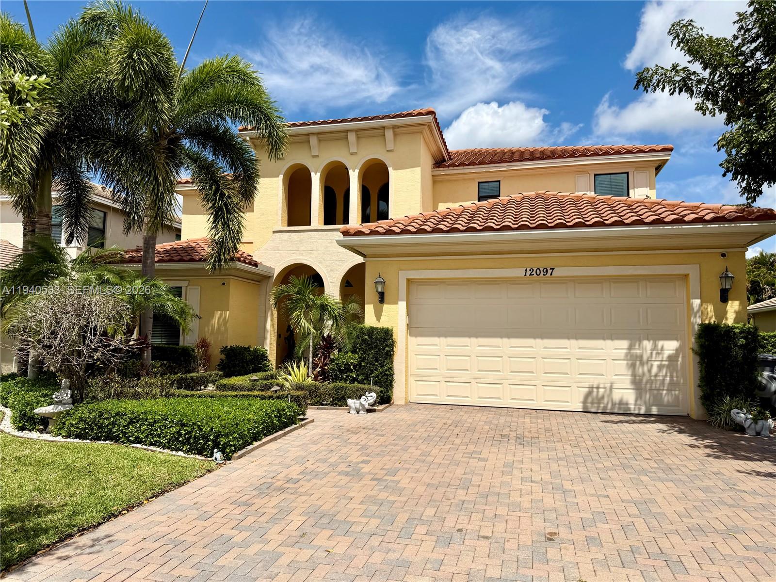Spacious 5-bedroom, 4.5-bath residence (with potential for up to 7 rooms) including a fully finished office on the first floor and a sitting room off the primary suite that can easily function as an additional bedroom, nursery, or private Den***Located in a prestigious gated community with top A-rated schools, this modern home features a dramatic 20-ft foyer with custom wood and steel staircase, porcelain and wood flooring, and impact windows throughout***The chef’s kitchen offers a large island, double ovens, coffee bar, stainless steel appliances, soft-close cabinetry, and tiled backsplash***Step outside to a private resort-style backyard surrounded by lush greenery featuring a heated saltwater pool, cascading waterfall, sun deck, jacuzzi, and automated patio screens***Additional highlights include a two-car garage with epoxy flooring, wall A/C, refrigerator, generator switch, and low HOA of only $235/month.