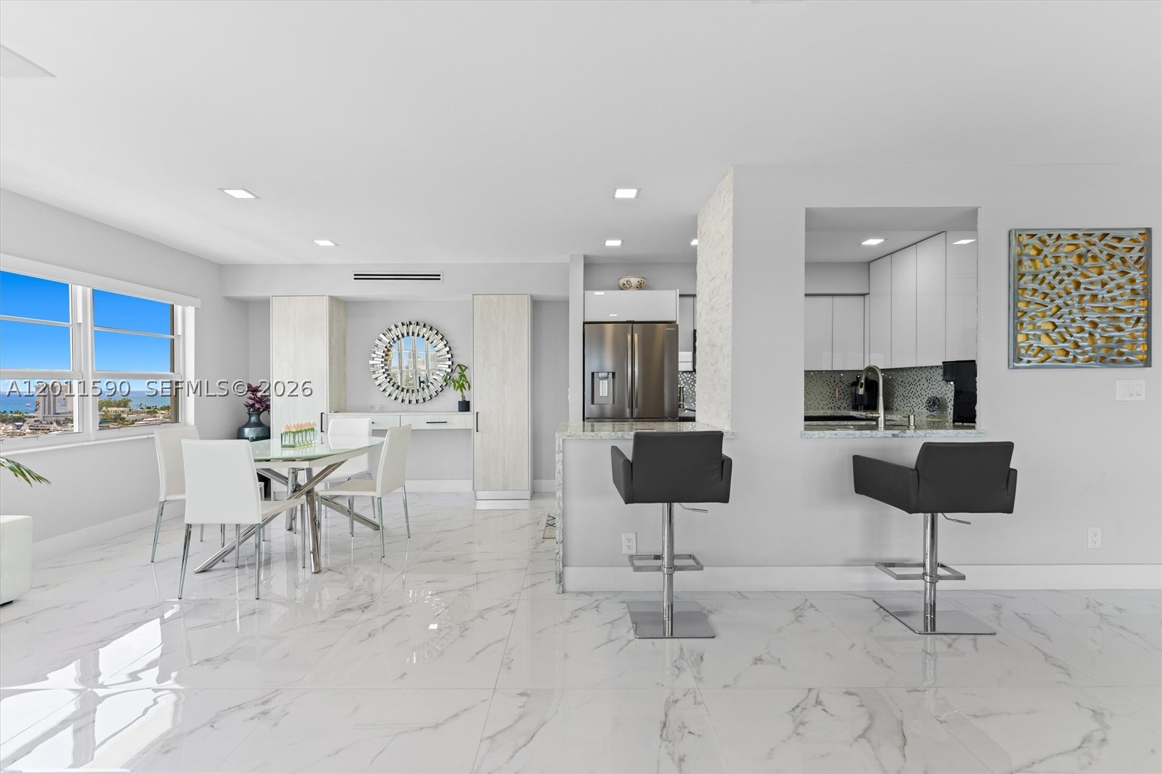 Welcome to Essex Tower, where sweeping ocean, Intracoastal, and  Isles views set the tone for elevated Fort Lauderdale living. This top-floor corner residence offers unmatched positioning in the building, delivering stunning sunrises, sunsets, and natural light from every angle, plus a private balcony to enjoy it all.

Extensively upgraded with over $200,000 in recent improvements, this spacious 2-bedroom, 2-bath   condo was thoughtfully converted from a 3-bedroom to create an open, modern layout with a light and airy feel. The interior features custom built-ins, generous storage throughout, and in-ceiling speakers for a seamless living and entertaining experience. The primary suite offers a walk-in closet and additional custom storage.

Impact windows and doors provide peace of mind. Additional highlights include a dedicated storage unit conveniently located on the second floor.

Enjoy resort-style amenities including a heated pool with BBQ and entertainment area, fitness center with water views, club room, library with WiFi, bike storage, and dry-cleaning service delivered to your door. Pet-friendly building with a 24-hour manned lobby.

Ideally located just minutes from the beach, Las Olas shopping and dining, and Fort Lauderdale-Hollywood International Airport.

HOA includes Vision WiFi, basic cable, water, and exterior insurance. 40-year inspection completed with a well-funded association.