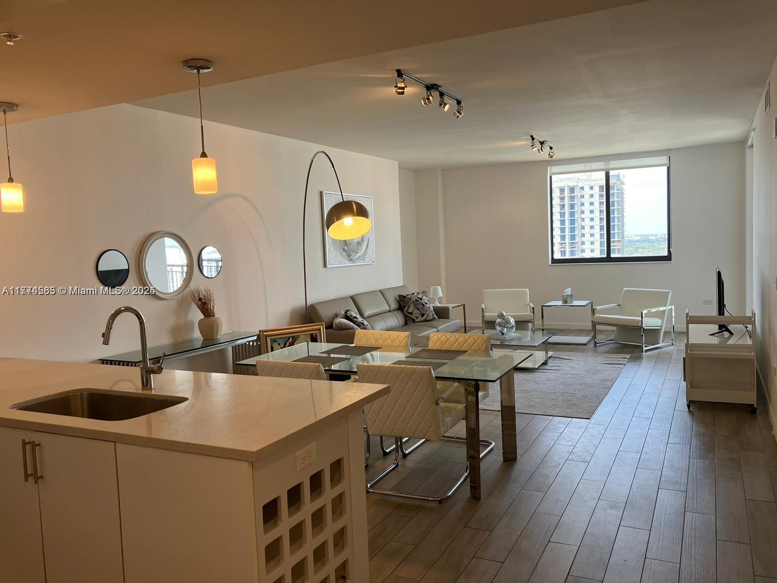 Discover the allure of this fully furnished, spacious apartment with a partial water view at Mary Brickell Village!
This expansive 1-bedroom unit, the largest in the building, boasts contemporary furniture, balcony with tiles, and a
mix of Italian cabinetry and stainless steel appliances in the kitchen. The bedroom features cozy carpeting, and
added conveniences include a full-size washer and dryer. Enjoy incredible amenities and the vibrant Brickell
lifestyle, all within walking distance to restaurants, cafes, and Brickell City Center. Smoking is not allowed
anywhere in the unit, including the balcony. Available for short-term rental, this is your opportunity to experience
the best of Brickell living.