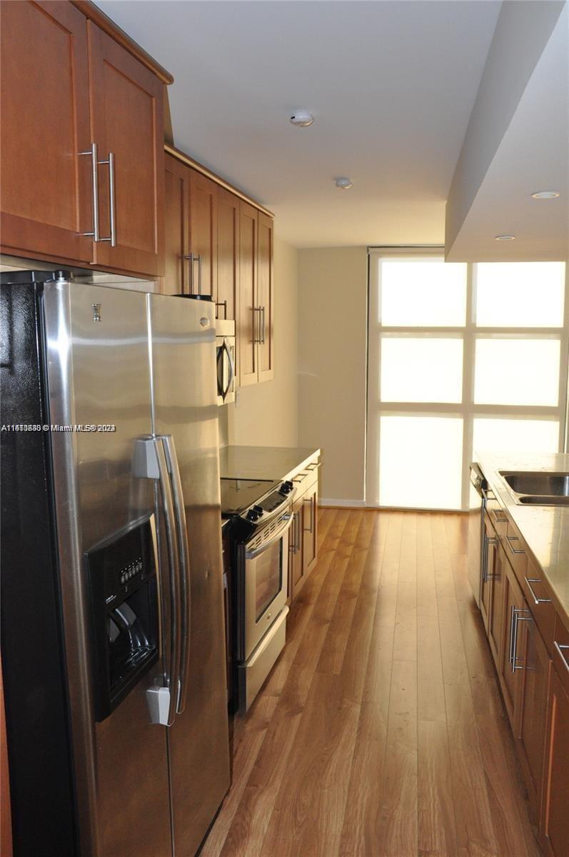NINE ISLAND AVENUE CONDO - Residential Lease