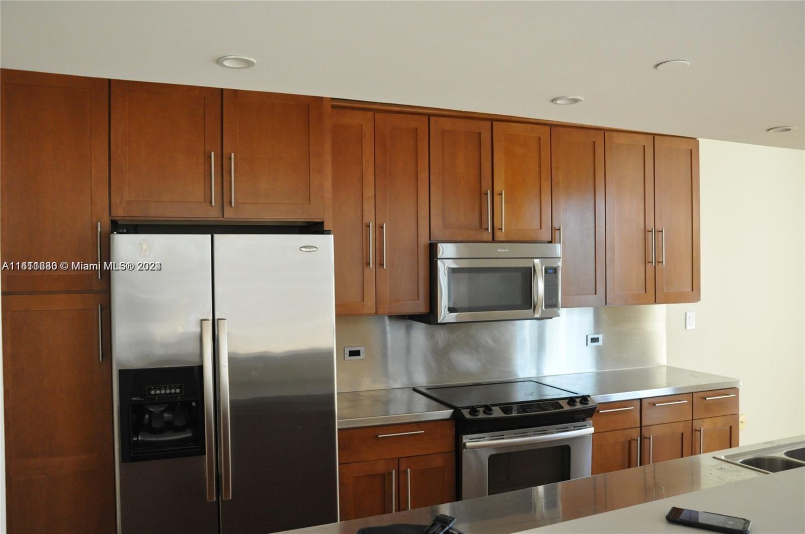 NINE ISLAND AVENUE CONDO - Residential Lease