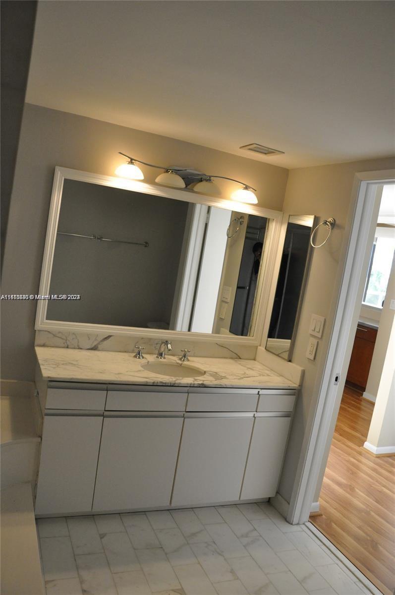 NINE ISLAND AVENUE CONDO - Residential Lease