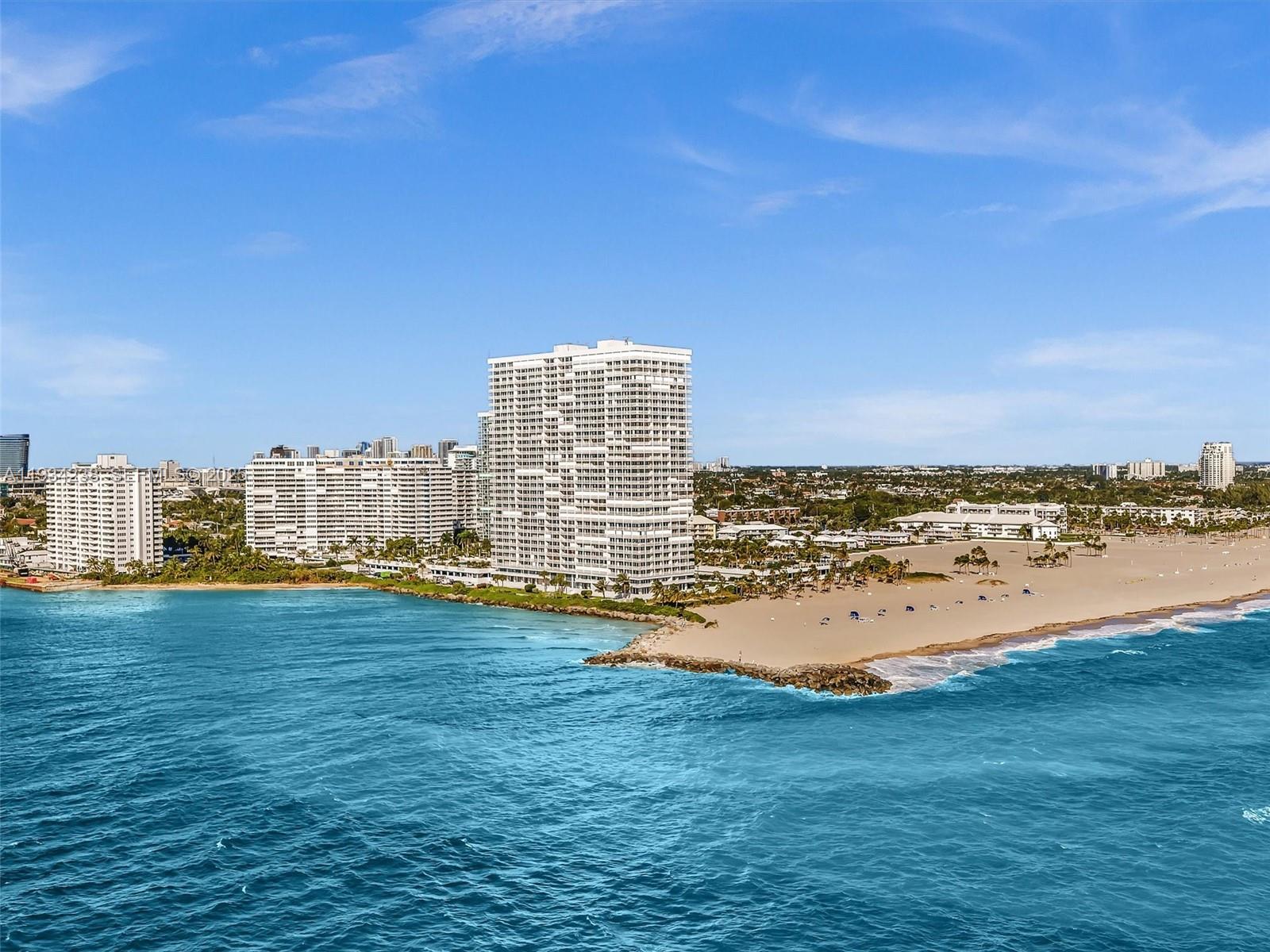 Timelessly elegant and contemporary, this stunning condo is located in the highly sought-after Point of the Americas II, renowned for its exceptional luxury living. Be captivated by the sophisticated interior, where modern design seamlessly blends with relaxed coastal elegance in this beautifully renovated 1 bed + den (possible 2 bed)/2 bath residence. Enjoy unobstructed ocean and beach views, creating a breathtaking backdrop from nearly every angle. Step inside and admire the meticulous attention to detail, every element thoughtfully executed with exceptional taste and refinement. The open concept kitchen flows effortlessly into the great room features Italian cabinetry and craftsmanship, quartz countertops and backsplash, an induction cooktop, and a ventless washer and dryer. Both bathrooms have been fully remodeled, and striking 48” x 48” tile flooring runs throughout the residence. Impact windows and doors complete the home. No expense spared here! Additionally, the entire building has been extensively renovated, including its impressive resort-style amenities: a large heated outdoor pool and patio with BBQs and smokers, the widest private beach in Fort Lauderdale, club and party rooms, state-of-the-art weight and cardio fitness centers, saunas, a massage room, storage/bicycle/golf club rooms, shuffleboard, four electric charging stations, guest suites, concierge desk, 24/7 security etc. Furniture available. This exceptional condo truly offers luxury living at its finest.