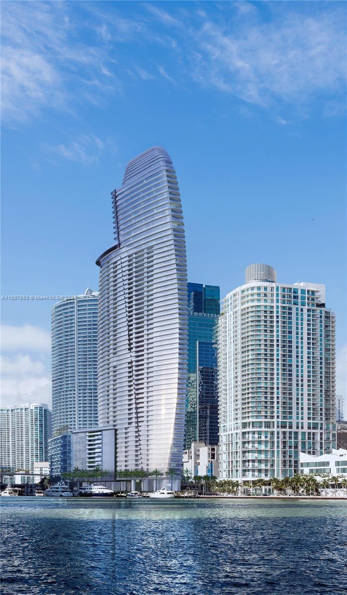Live the Aston Martin lifestyle in Residence 4003 – a stunning corner unit with breathtaking views of the Miami River, Port of Miami, and Key Biscayne. Enjoy expansive living spaces, floor-to-ceiling windows, private terrace, and a separate staff room with full bath. Perfect for families seeking comfort, elegance, and functionality. Located in one of Miami’s most iconic towers with world-class amenities: sky lounge, infinity pool, marina, spa, and more. A true masterpiece in the sky.