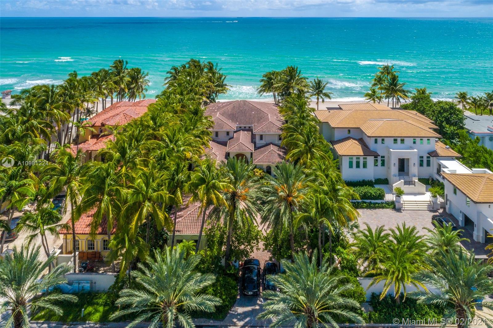 Welcome to your very own beach oasis! A completely enclosed compound on the exclusive Ocean Boulevard,  this lush estate sits on a 25,350 sq ft lot right on the private sands of Golden Beach. Step into a grand entry with tremendous ceilings, ocean views, an open floor plan that is family friendly with the perfect balance of paradise and sophistication. In addition to a private beach, the home offers its own amenities such as a spa sauna, massage room, gym space, movie theatre and a massive basement.