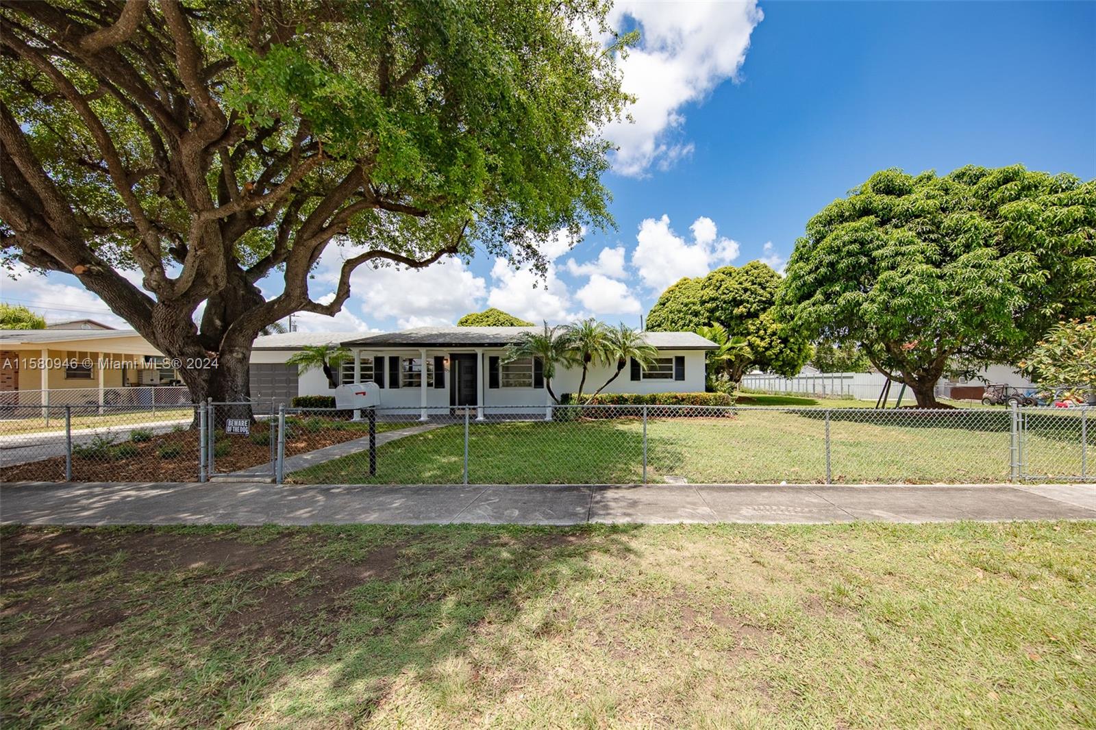 Welcome to 525 NW 14th St, Homestead, FL 33030! The property boasts a new roof from 2021. The kitchen features wood cabinets, granite countertops, and black stainless steel Samsung appliances. Enjoy a spacious layout, freshly painted interiors and exteriors. The master suite includes a walk-in closet, and additional bedrooms are generously sized. NO HOA or CDD fees. Plenty of space for parking your toys and adding a pool on the OVERSIZED LOT totaling 15,187 sqft, comprised of two combined fully fenced parcels (10-7812-007-0190 & 10-7812-007-0181) Conveniently located near amenities. Schedule your showing today!