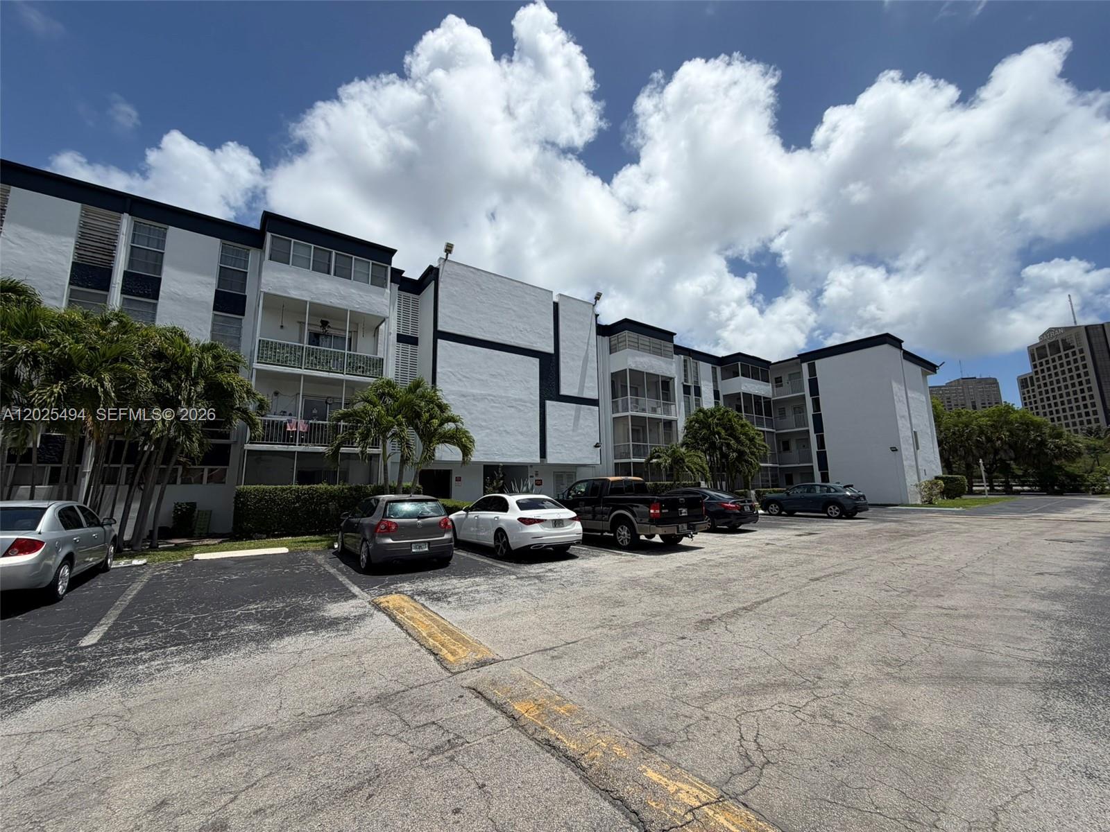Welcome home to this turnkey, well maintained and cared for first-floor 2/2 corner unit condo with 2 master bedroom closets (1 walk-in) situated in the highly sought-after Dadeland area. Freshly painted, this unit offers the perfect blend of location and convenience! This unit is tucked away around the back which provides you the ability for instant access to your condo and the ability to park right in front of your unit allowing you a private entrance where parking is not an issue. This is the perfect investment for anyone who's looking to rent quick or use this as their primary residence. This building has also passed it's 50-year certification!